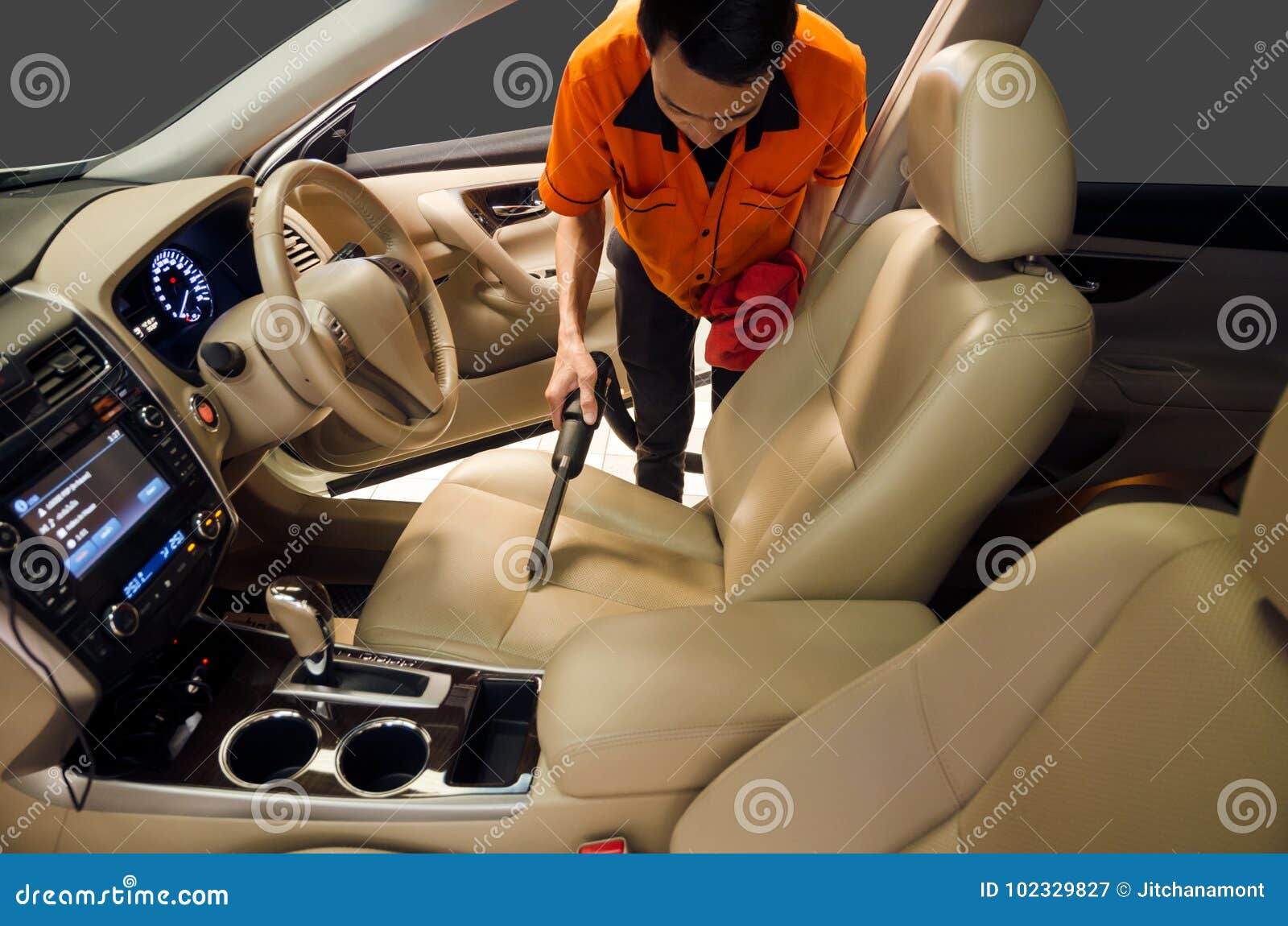 Cleaning Of Interior Of The Car With Vacuum Cleaner Stock