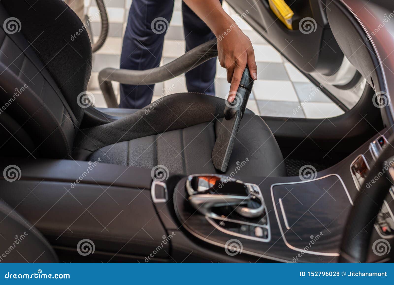 Cleaning Of Interior Of The Car With Vacuum Cleaner Stock