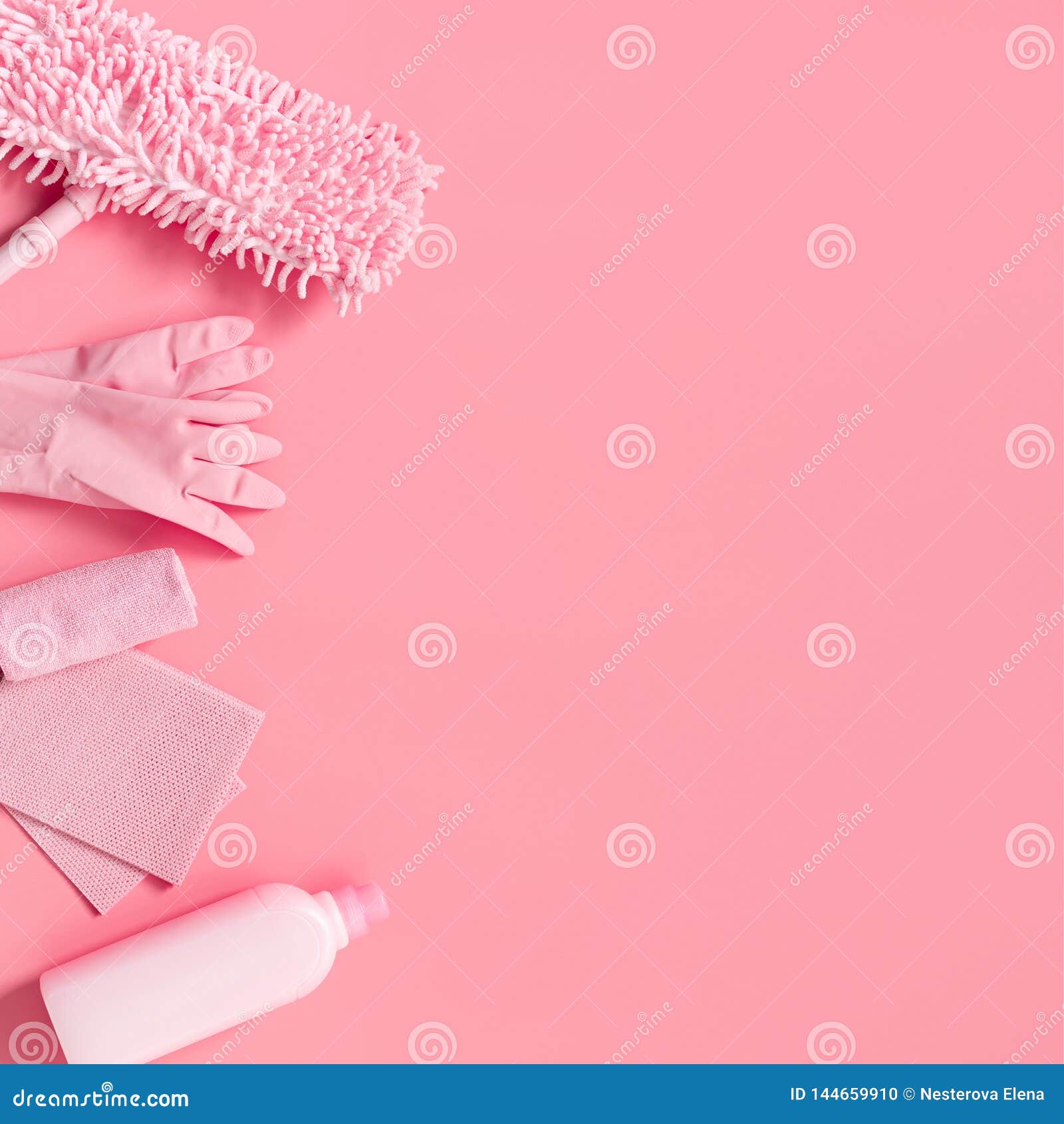 Cleaning Kit on a Pink Background. Copy Space.. Stock Photo Image of
