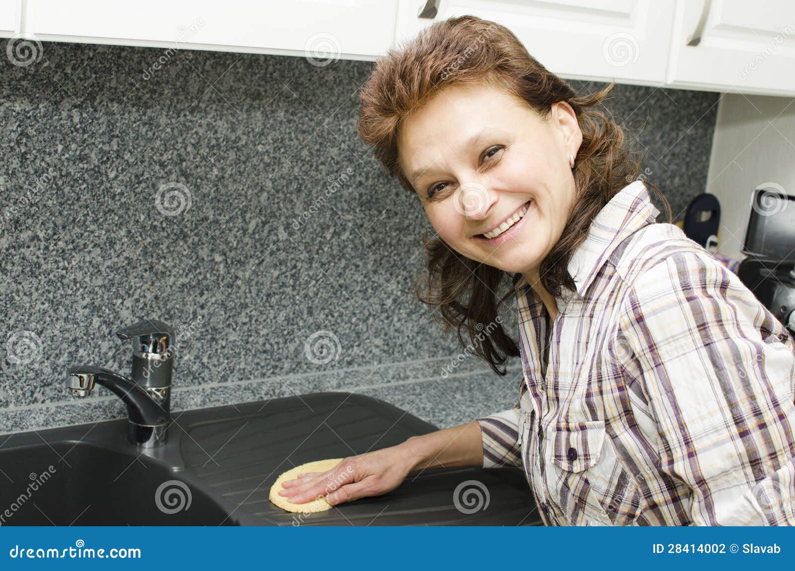 Cleaning the kitchen stock photo. Image of beautiful 28414002