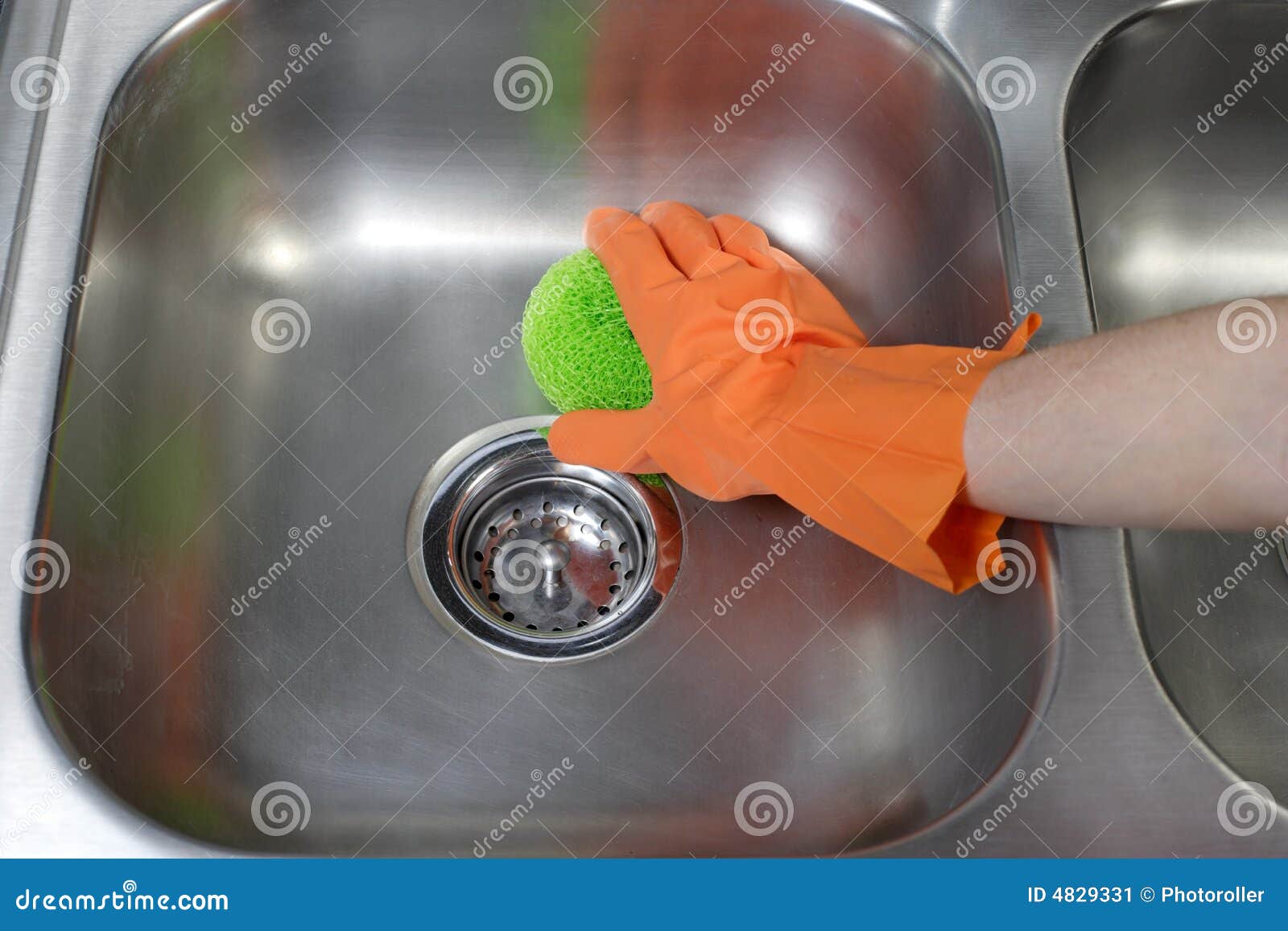 Cleaning Kitchen Appliance Vents On Microwave RoyaltyFree Stock Photography