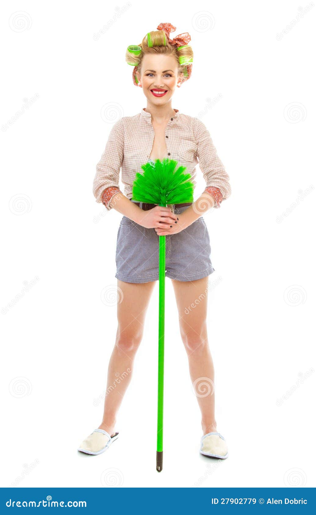 Cleaning lady. Funny cheerful smile housewife / girl with broom, isolated on white. Full length / total shot of domestic woman