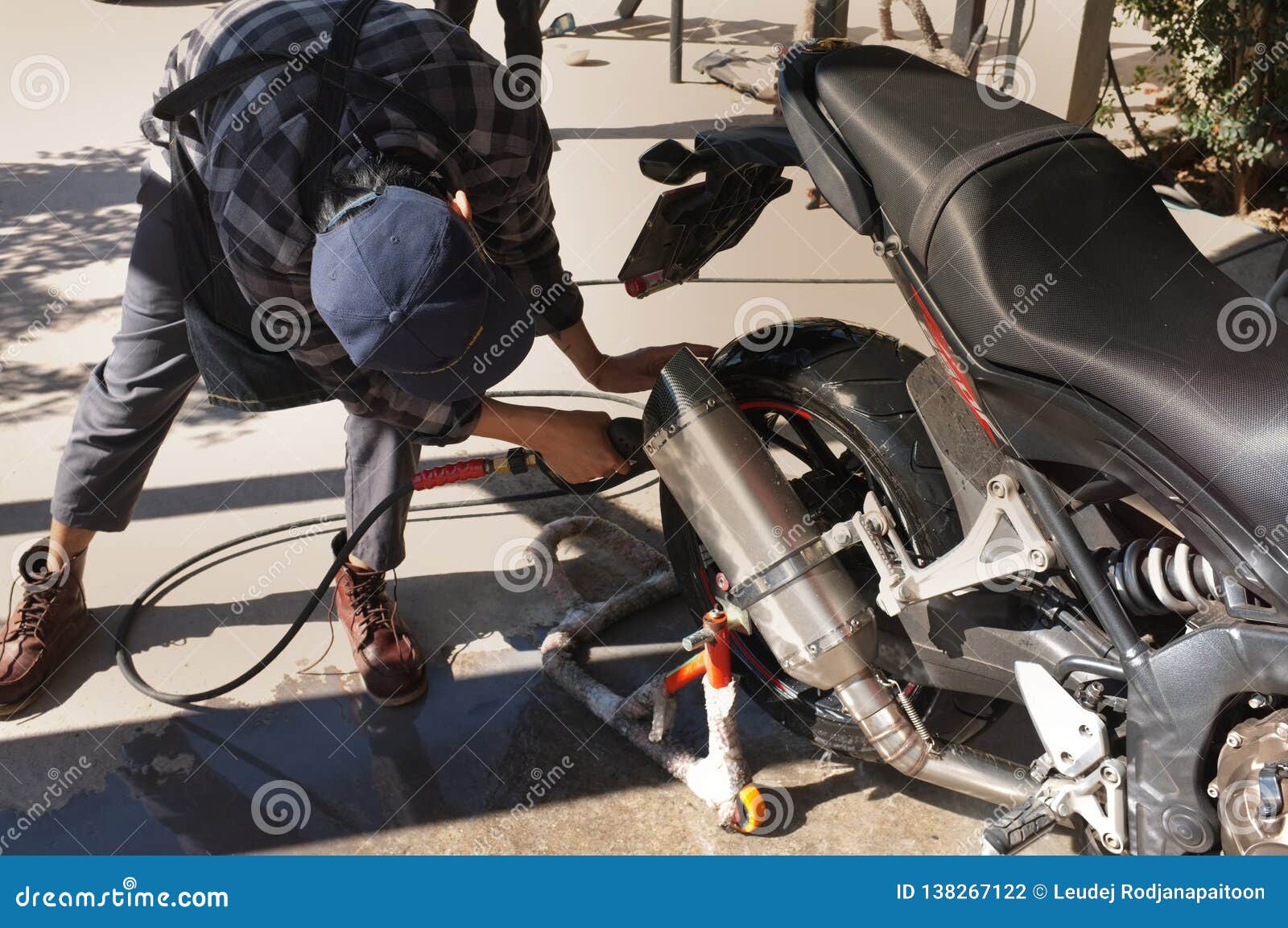 Cleaning Motorbike with Water Stock Photo Image of people, cafe