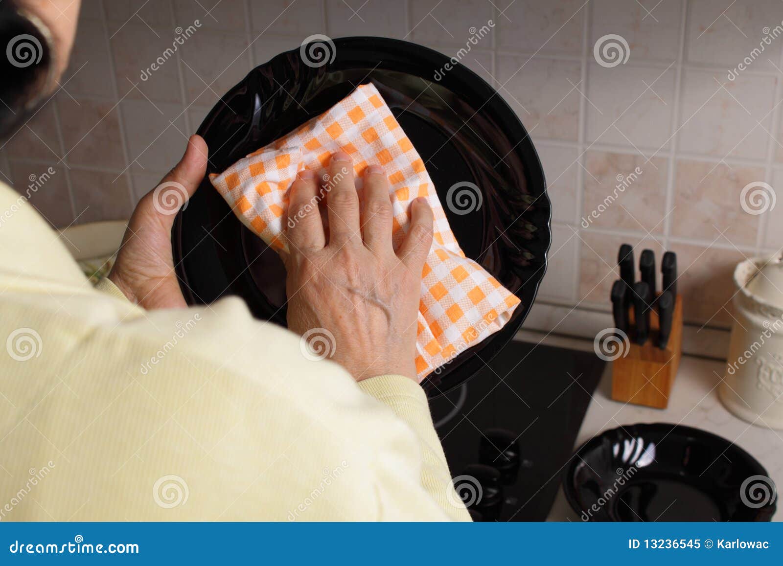 Cleaning Plates in the Kitchen Stock Image Image of woman, alone