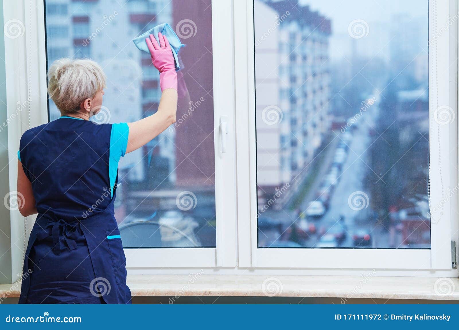 Cleaning Service. Woman Washing Window With Cloth Stock Photo