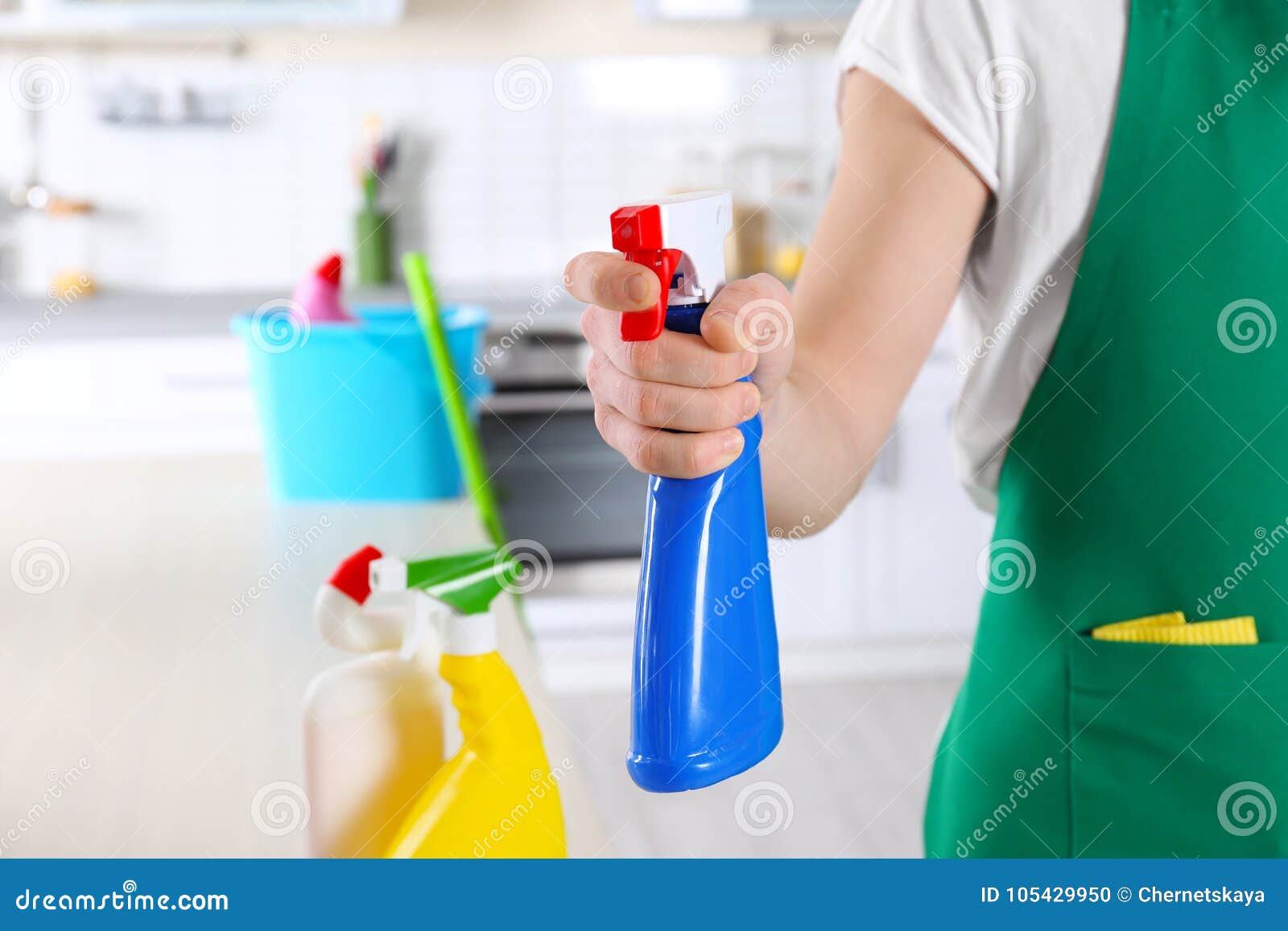 Cleaning Service Worker Holding Bottle with Cleanser, Stock Photo