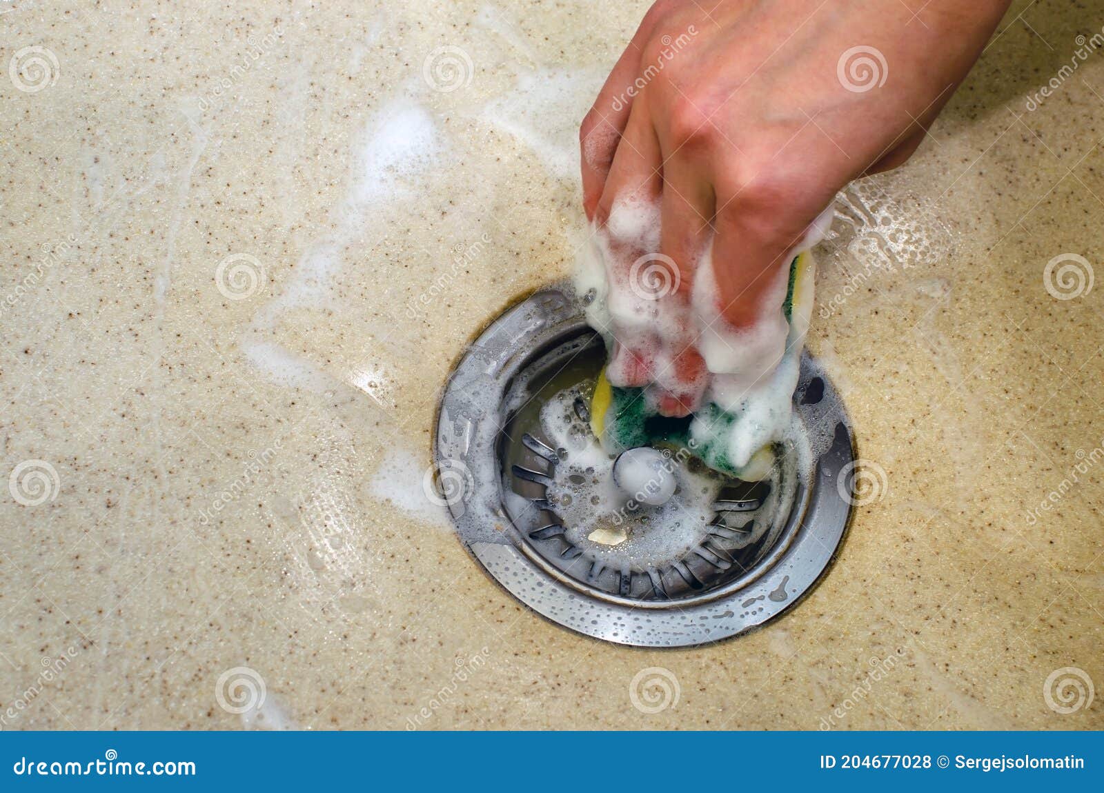 Cleaning the Sink Drain. Cleaning Solid Surface Sink. Housework Concept. Stock Photo Image of