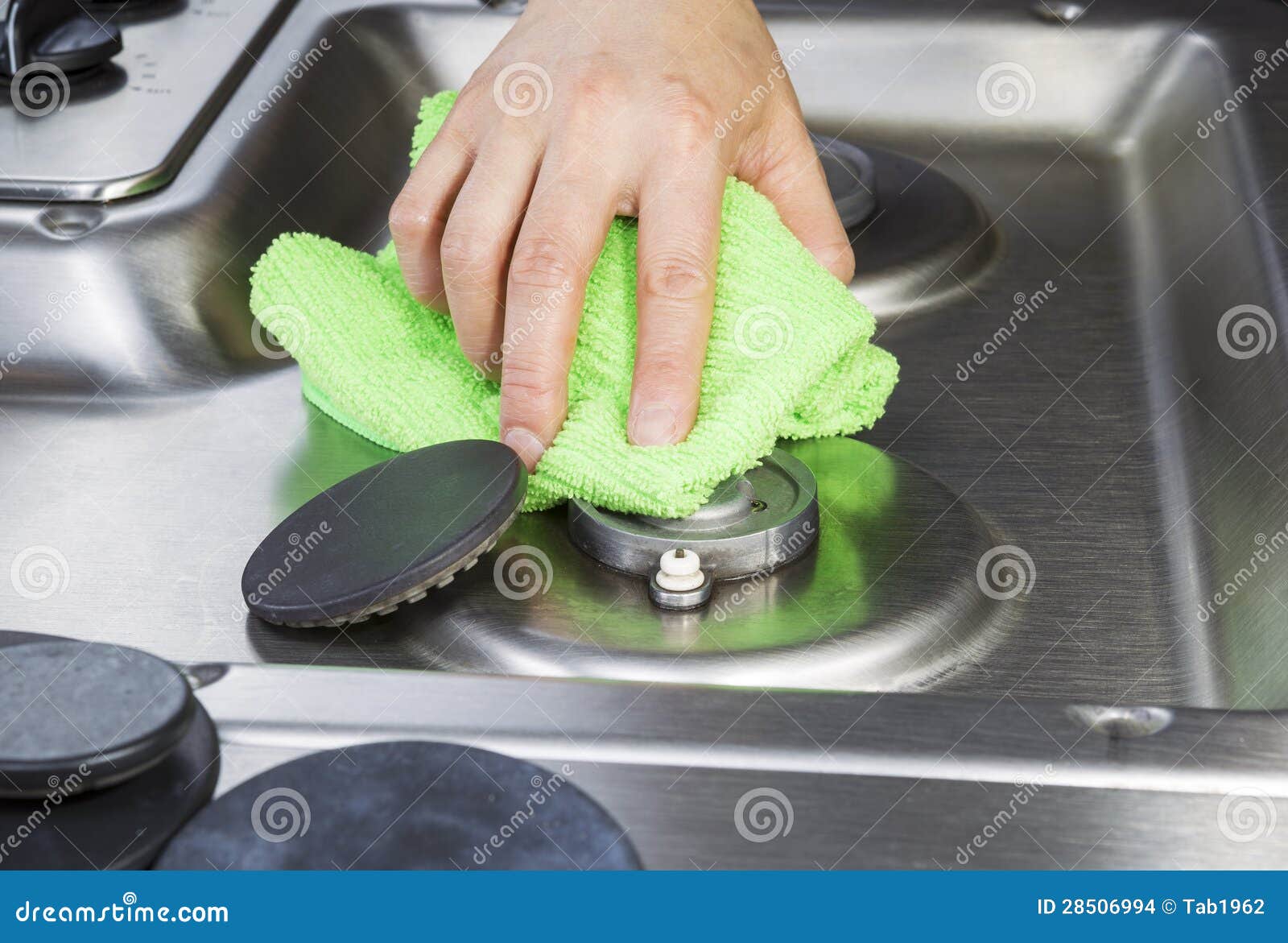 Cleaning Stove Top with Microfiber Cloth Stock Photo Image of curved