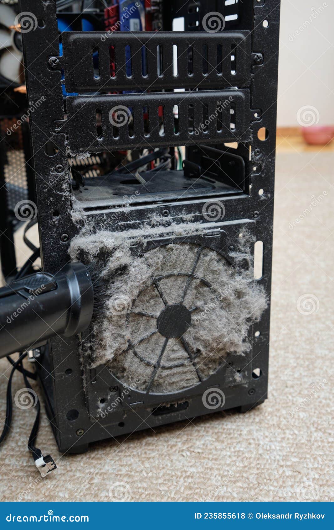 Cleaning the System Unit of Desktop Computer from Dust with a Vacuum