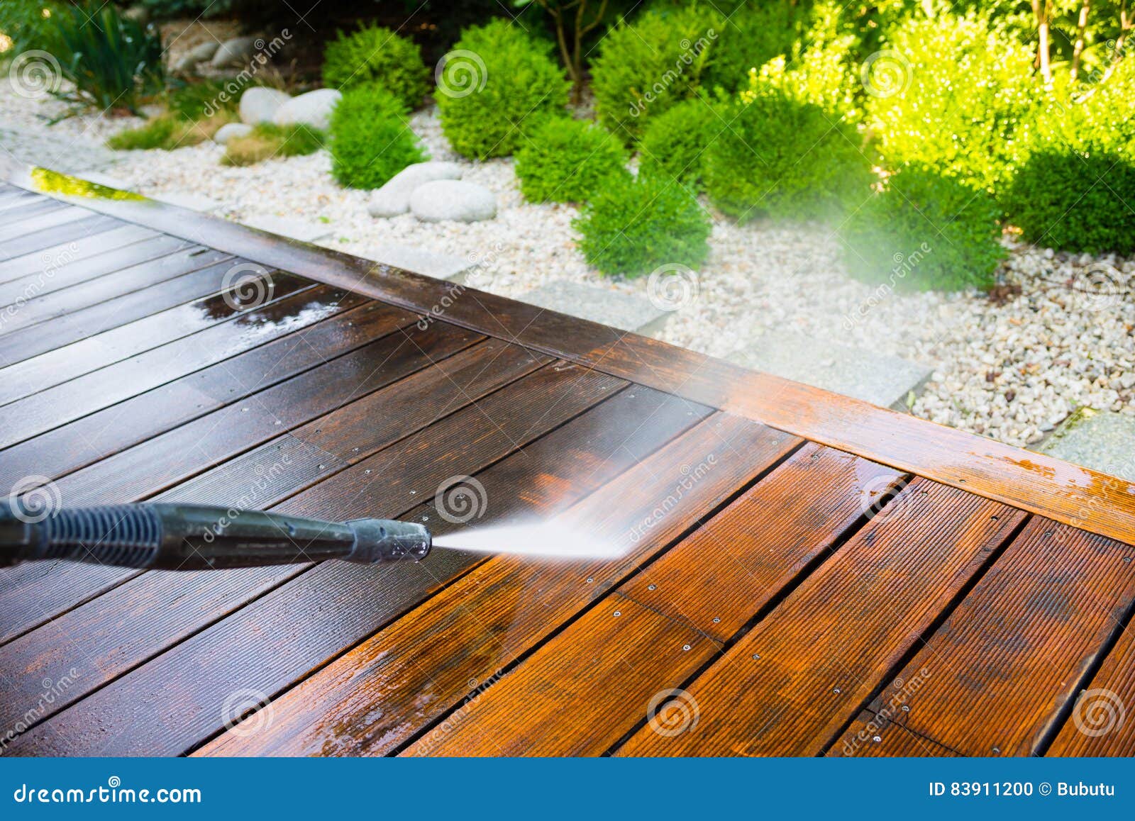 cleaning terrace with a power washer