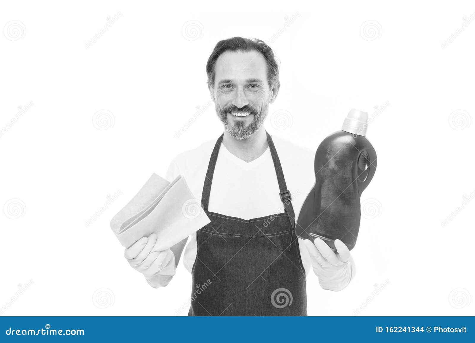 cleanness is in his hands. mature household helper. mature household worker holding laundry detergent in rubber gloves