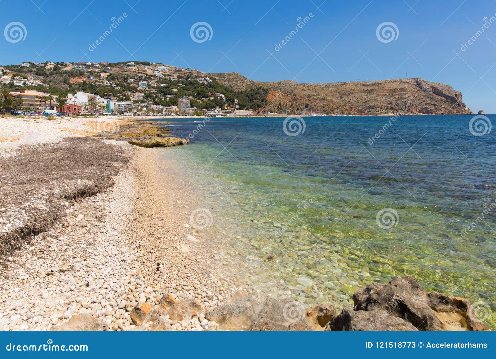 clear blue sea xabia spain at platja de la grava beach located south-east of denia also known as javea