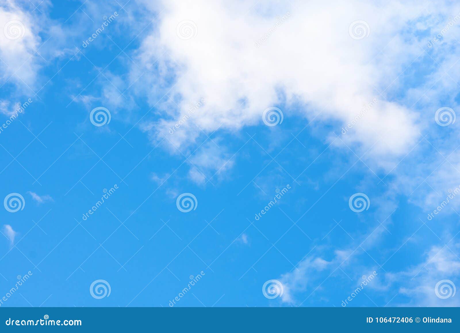 Clear Blue Sky with Small Fluffy Transparent White Clouds in the Corner ...