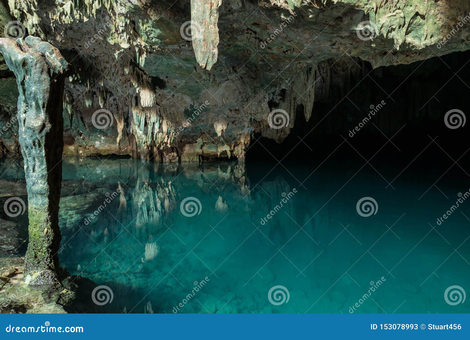 a clear blue underground lake popular with swimmers in gua rangko rangko cave near labuan bajo, flores, indonesia