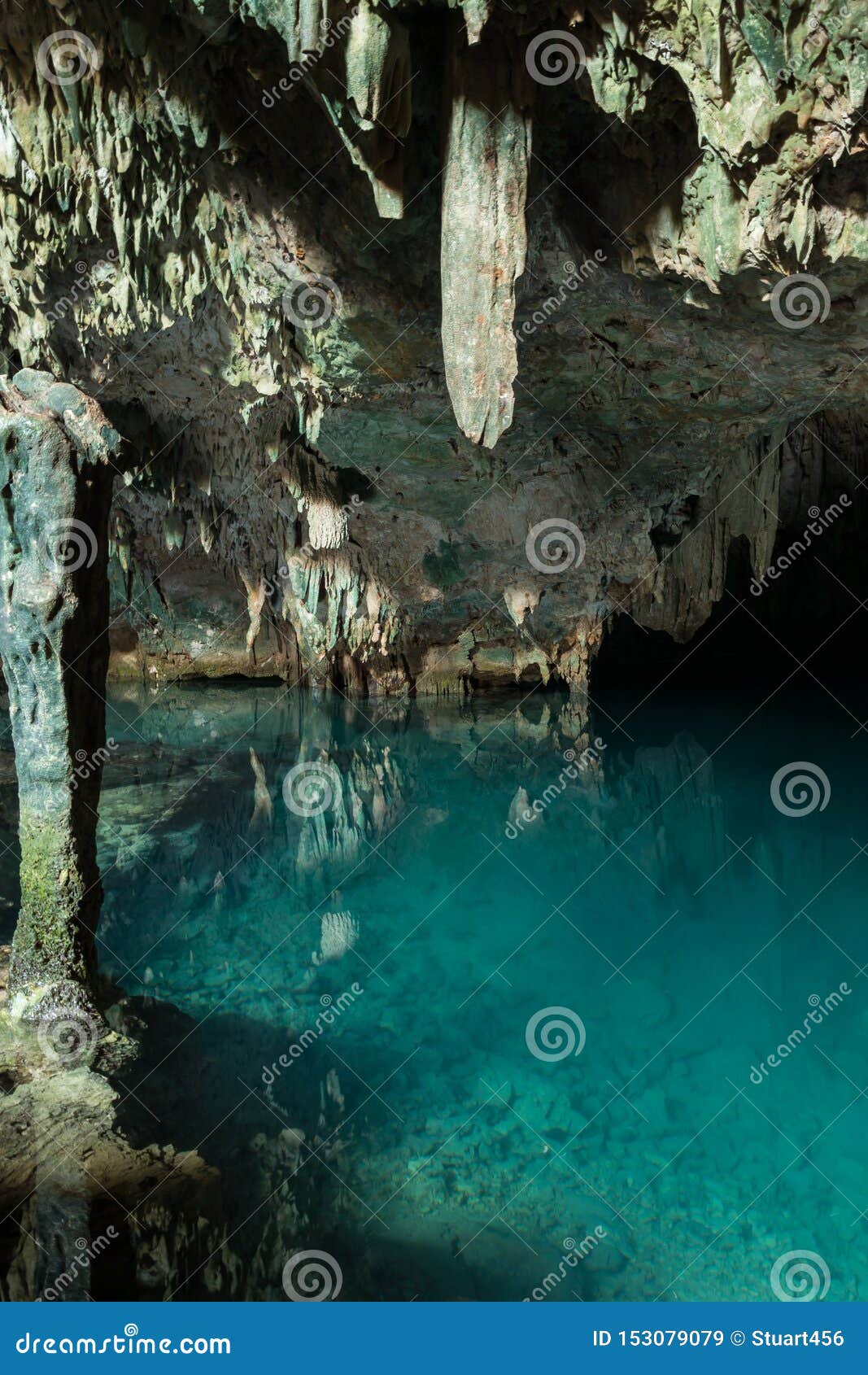 a clear blue underground lake popular with swimmers in gua rangko rangko cave near labuan bajo, flores, indonesia