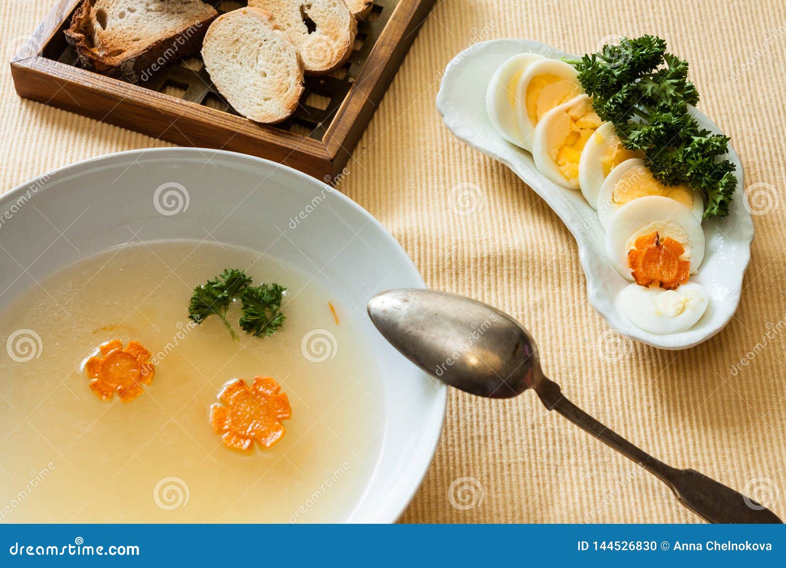 Clear Chicken Broth and Egg Stock Photo Image of spoon, vegetable 144526830