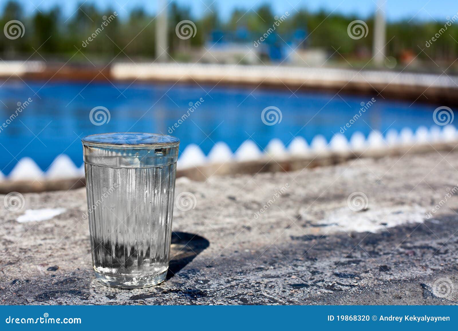 clear glass filled with purified water