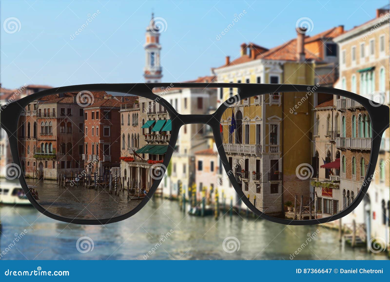 Clear Image in Glasses Against Blurry Landscape Editorial Photography