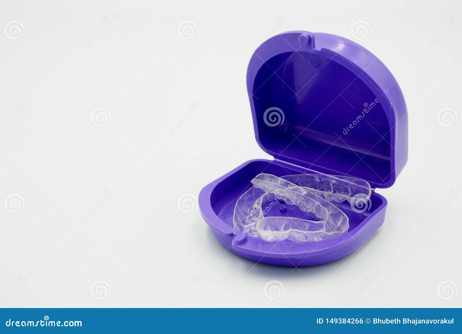 clear plastic retainer teeth in the boxset, it`s a new technology equipment for orthodontist give the patient to orthodontic