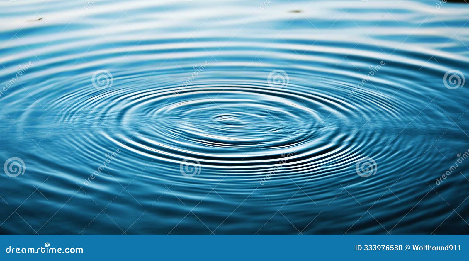 clear, undisturbed water with subtle, circular ripples spreading from a central point. the