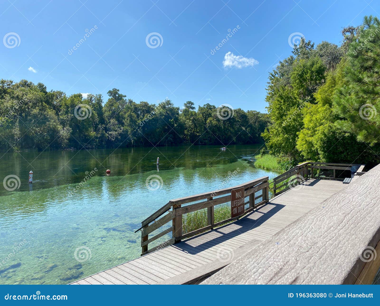 A Water Rainbow Sparkled From Splashing During A Car Wash RoyaltyFree