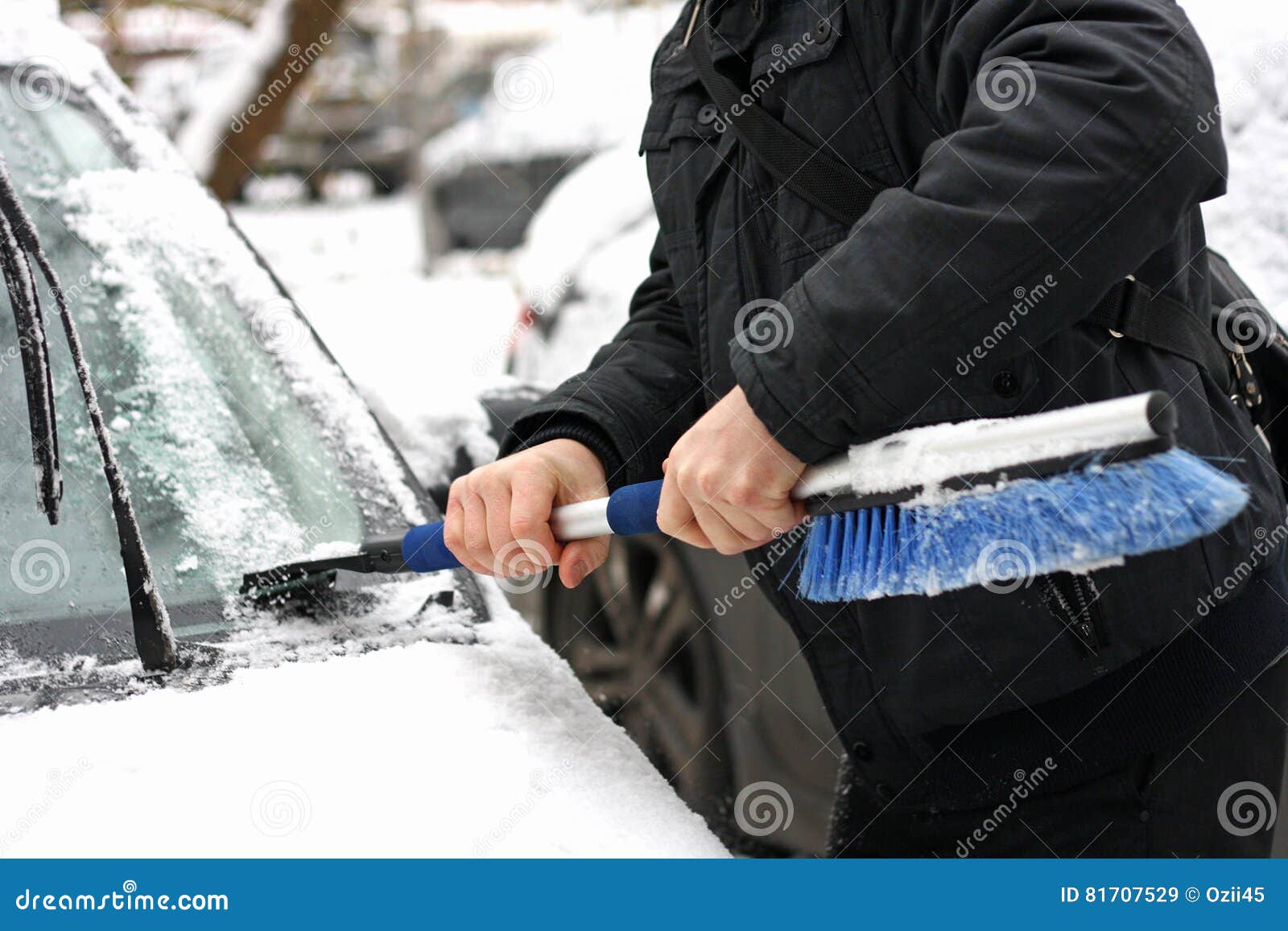 Clearing car of snow. stock image. Image of brush, people 81707529