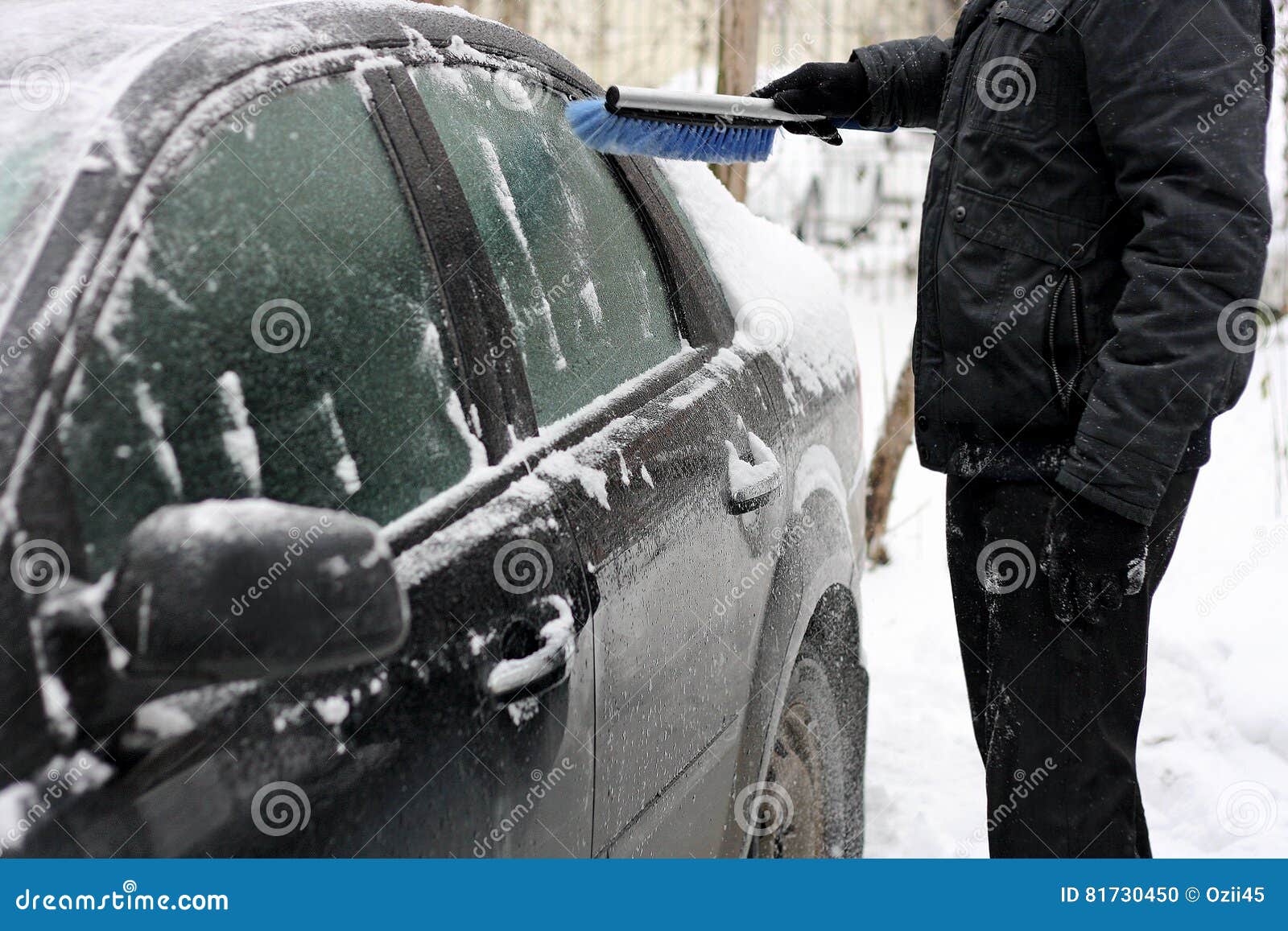 Clearing car of snow. stock photo. Image of person, effort 81730450