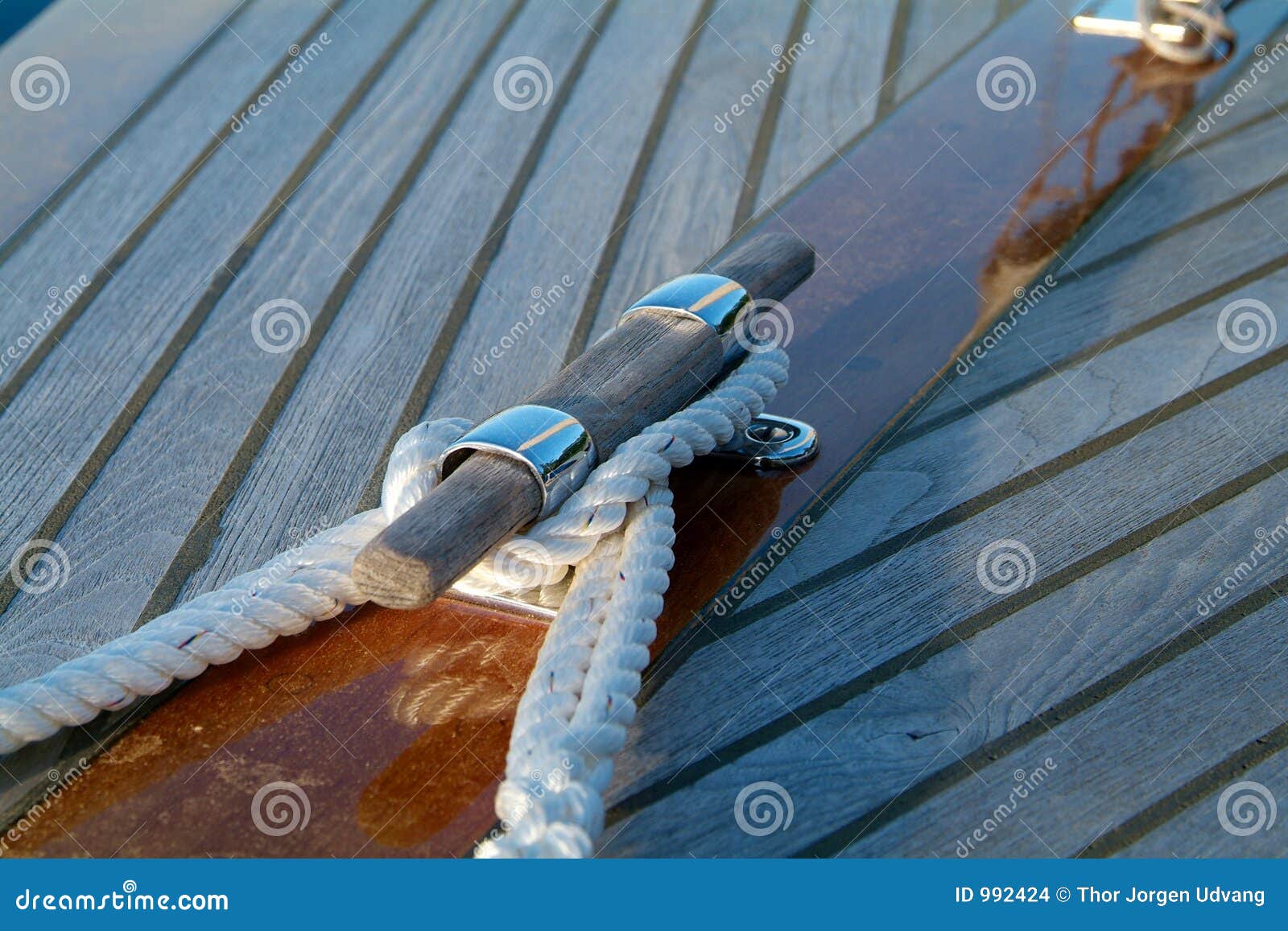 Cleat And Rope On A Wooden Sailboat Stock Images - Image 