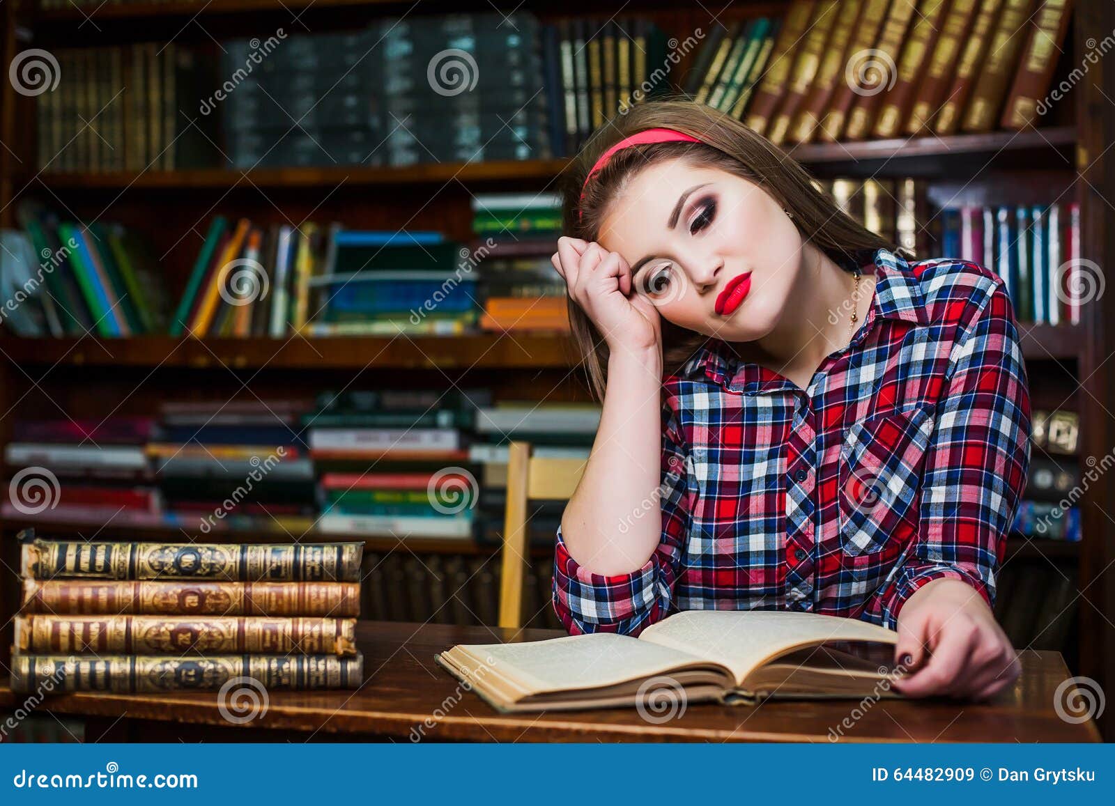 Clever Female Student Girl Sitting In Library With Books. Stock Image - Image of ...1300 x 957