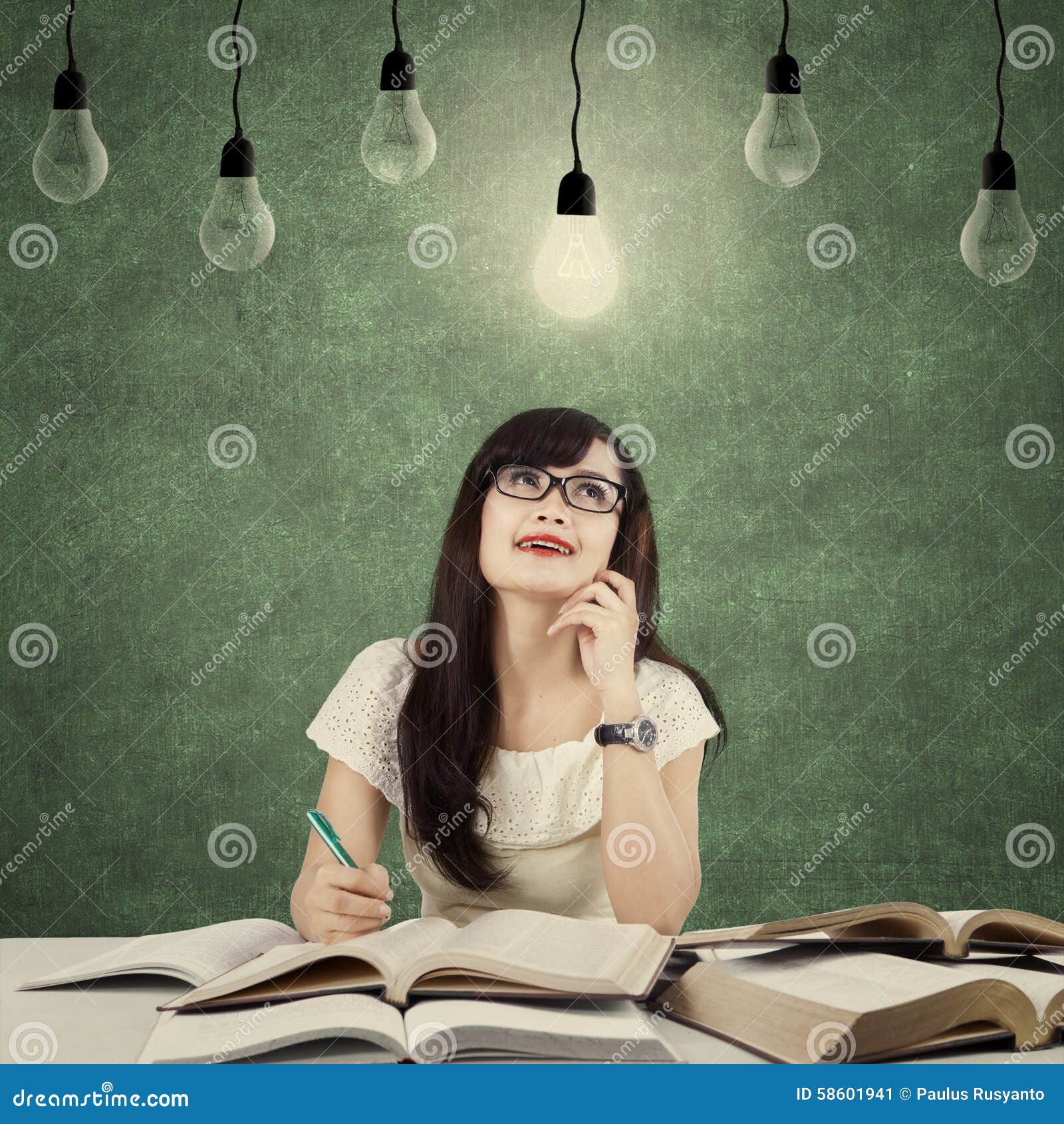 Clever Student Get Inspiration Under Light Bulb Stock Photo - Image: 58601941