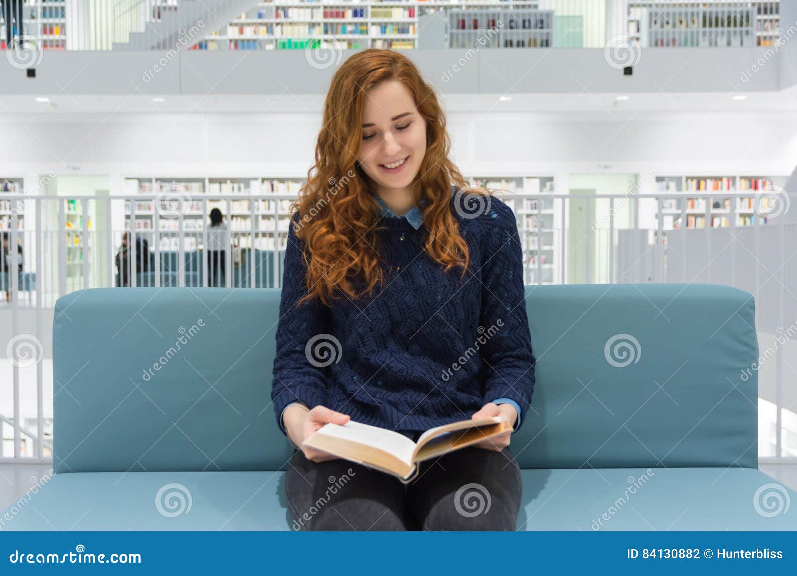 Clever University Student Studying In White Modern Library Books Stock Photo - Image ...