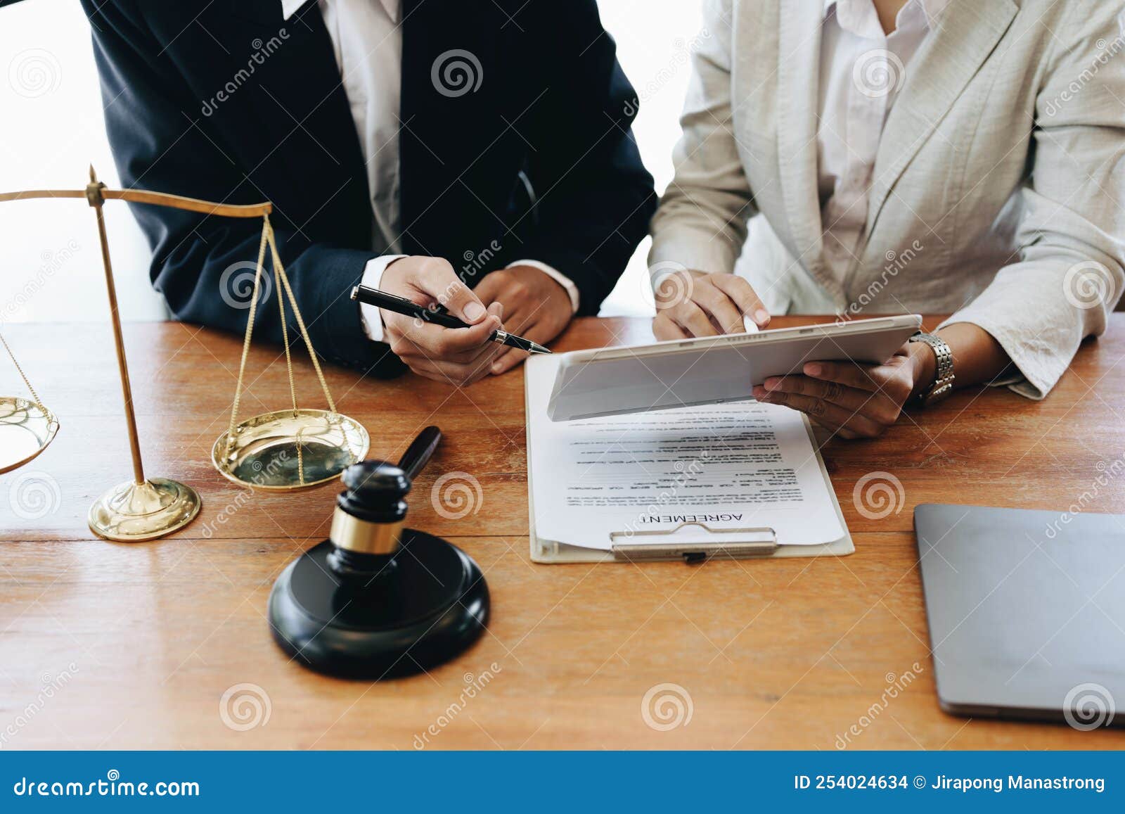 The Client is Consulting with a Lawyer on Legal Matters Stock Photo