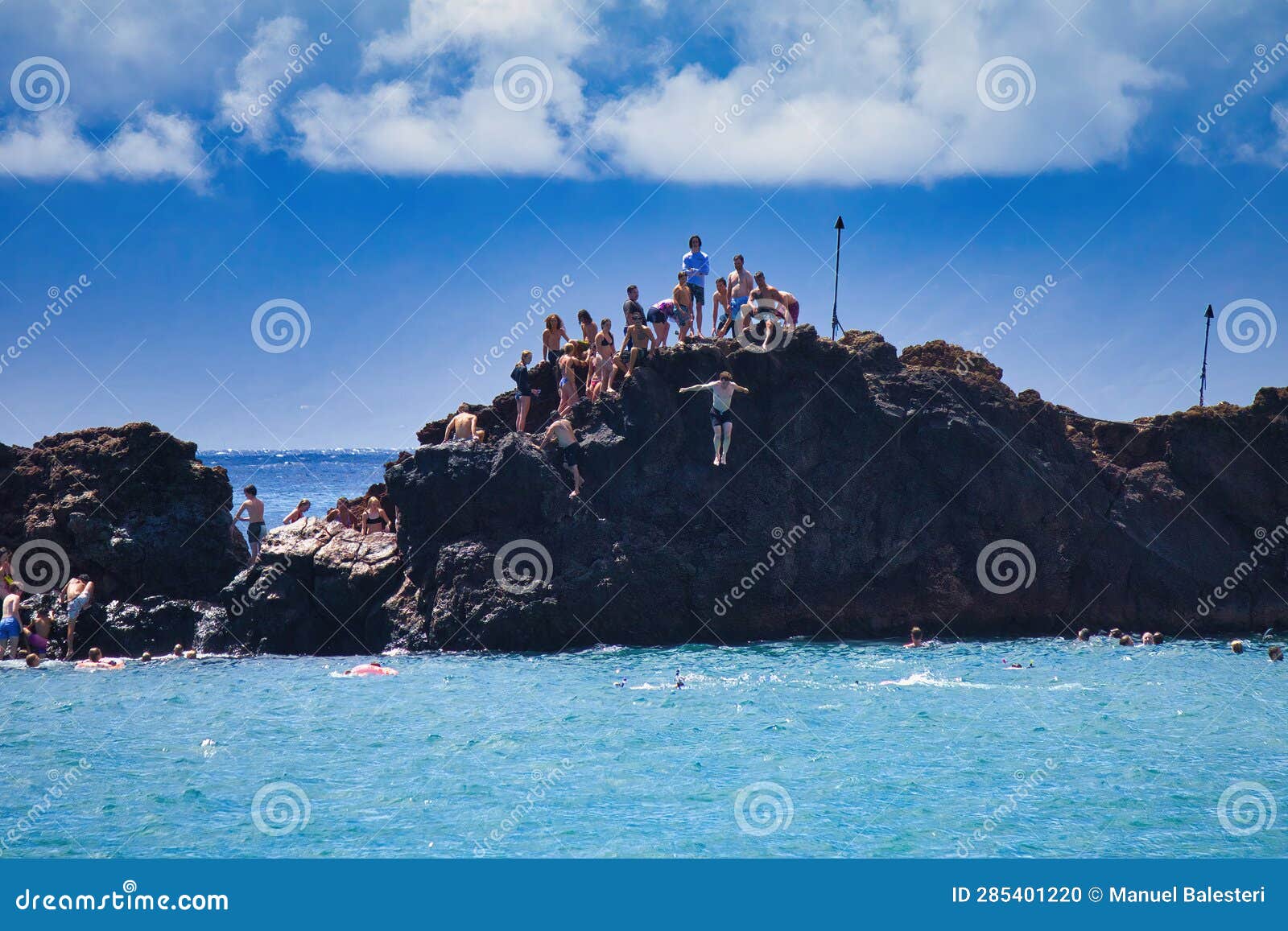 Cliff Divers at Black Rock on Maui. Editorial Image Image of people