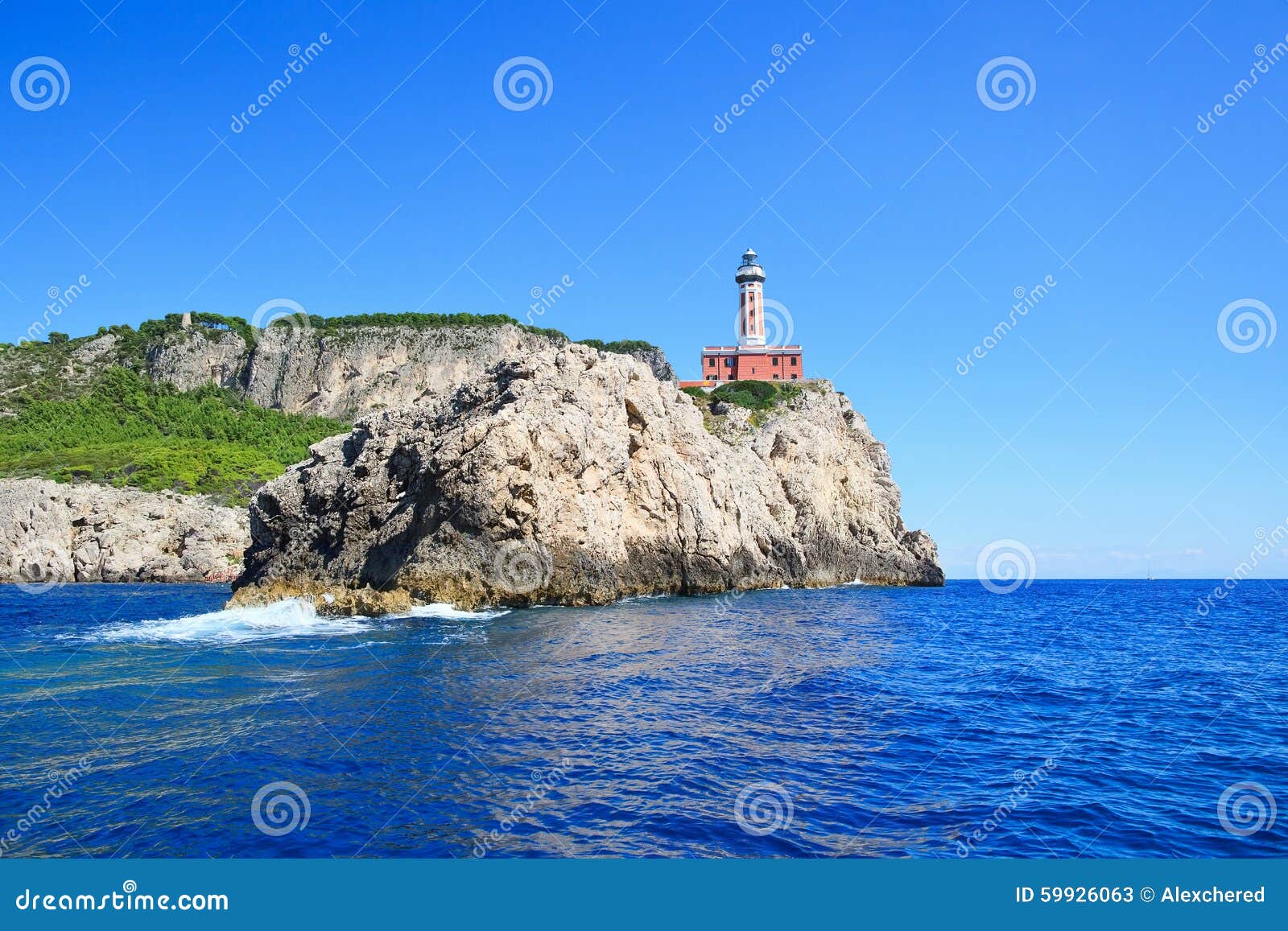 cliff punto carena with lighthouse on coast of tyrrhenian sea, c