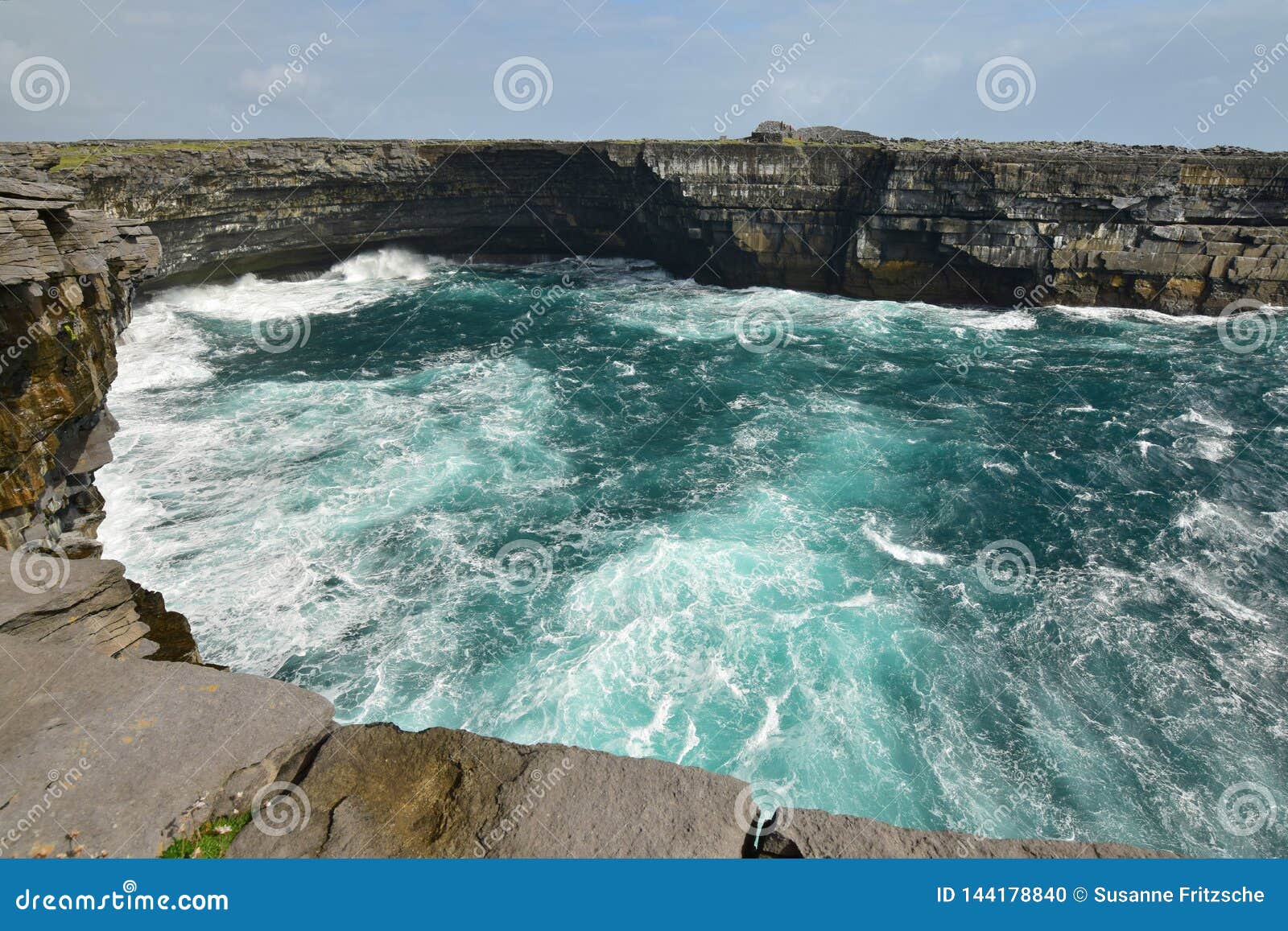 Cliffs Of The Aran Island Inishmore With Dun Duchathair In The Background Ireland Stock Photo Image Of Chathair Gaelic