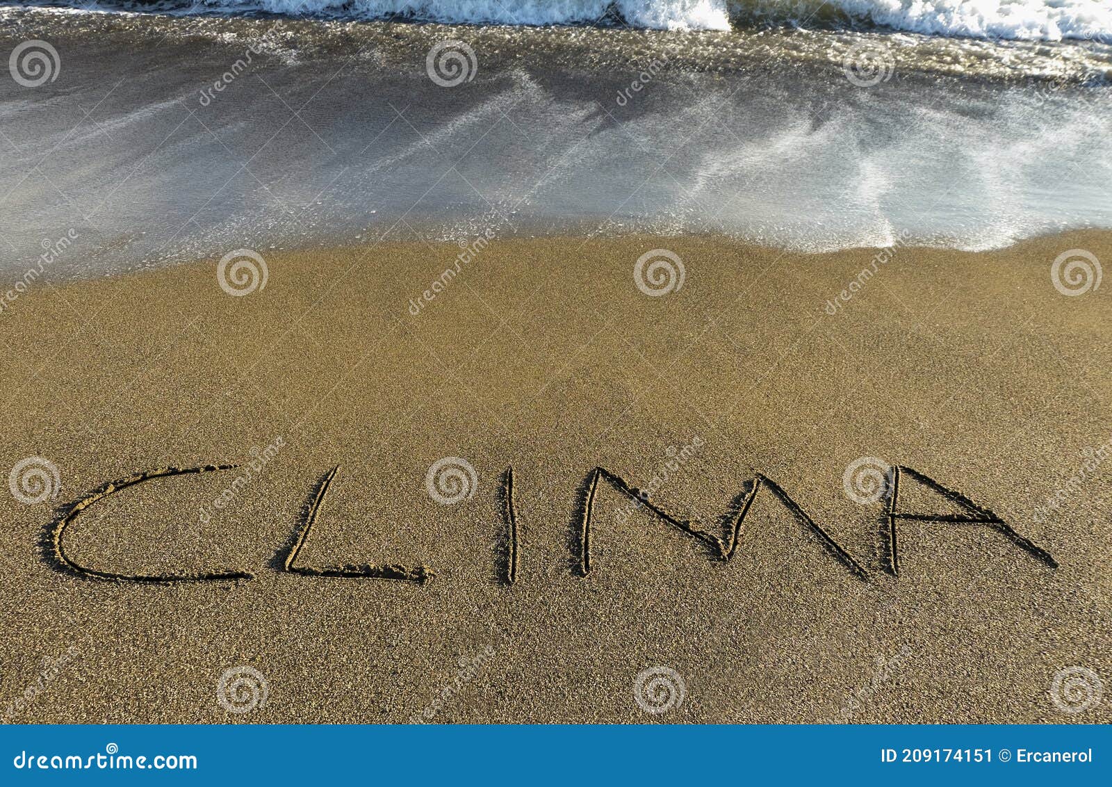 clima written in sand at the seaside