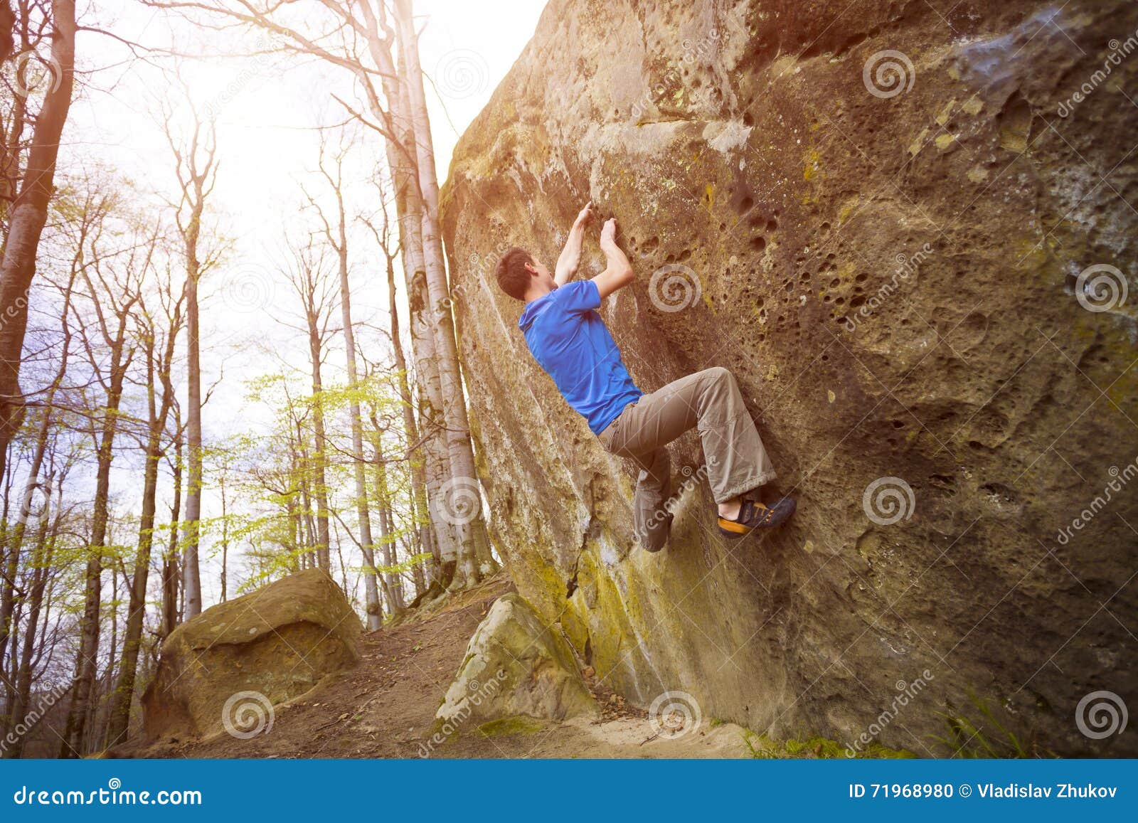 Climber is Bouldering on the Rocks. Stock Photo Image of bouldering