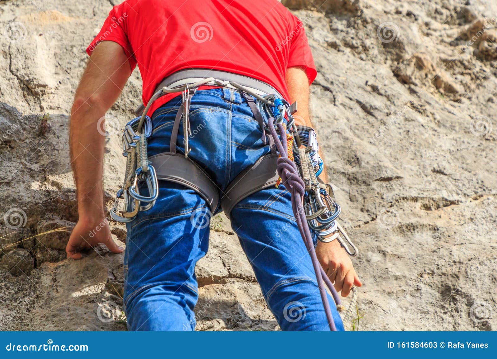 Climber Hanging with Express Tape on His Safety Harness Stock Image