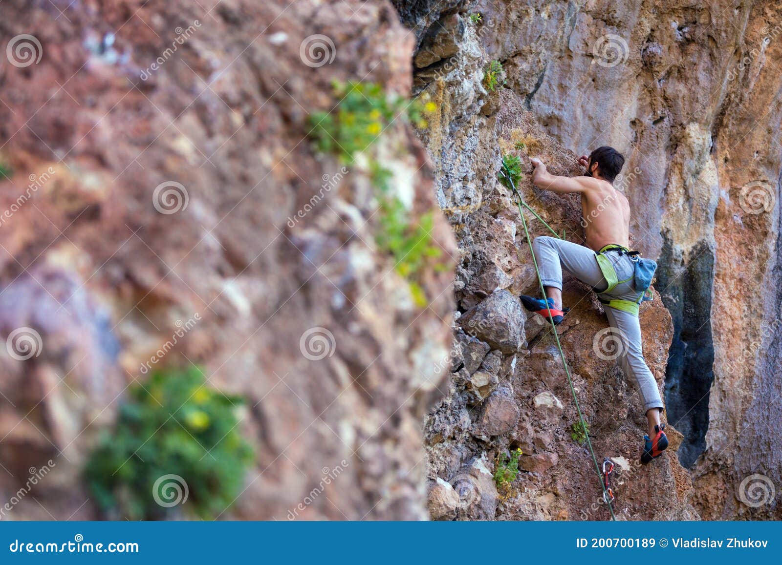 Climber a Difficult Climbing Route on a Natural Terrain Stock