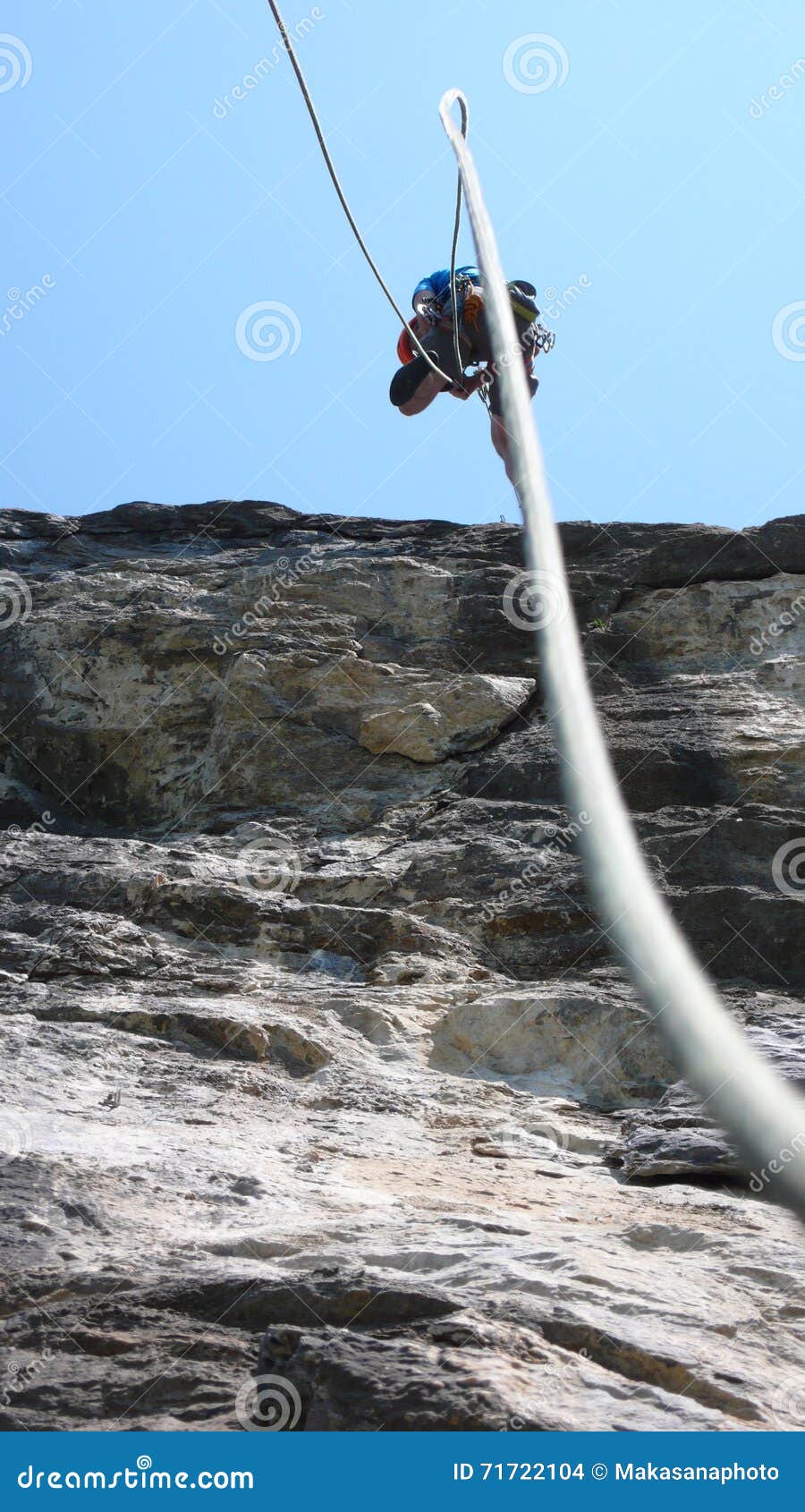 Climber Rappelling Off a Mountain in Switzerland Stock Photo Image of