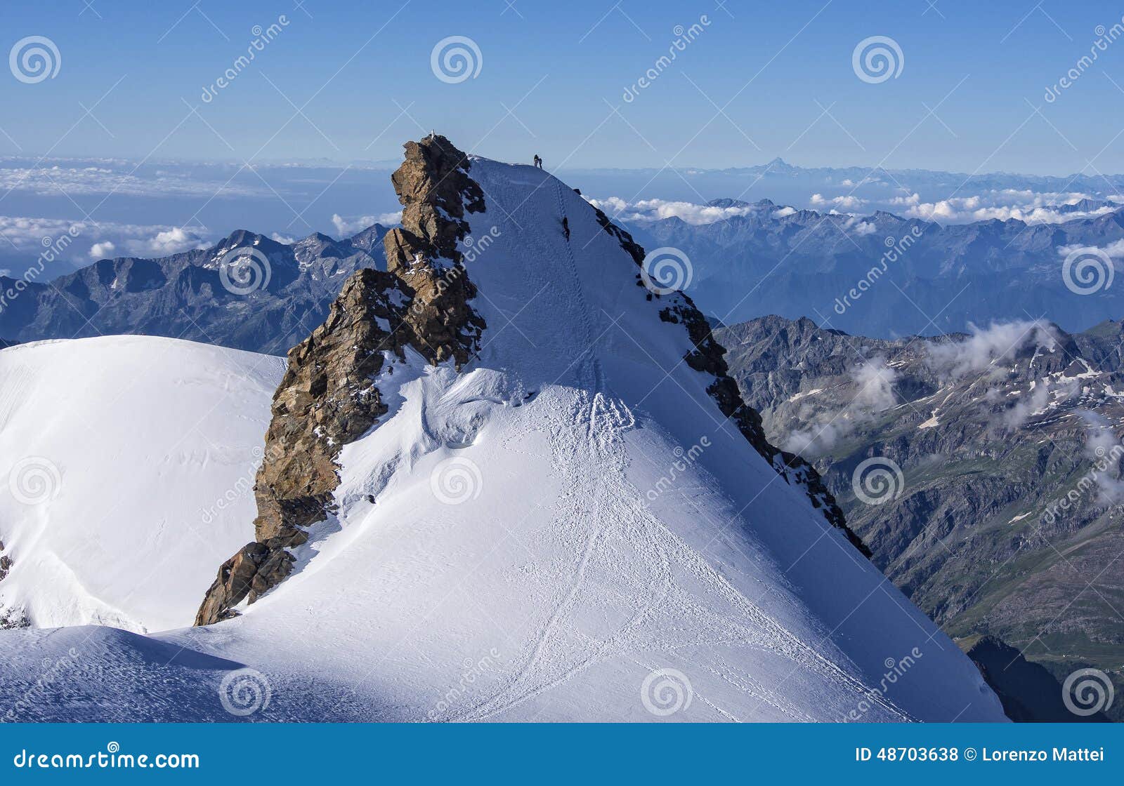 climbers on corno nero peak, monte rosa, alps, italy