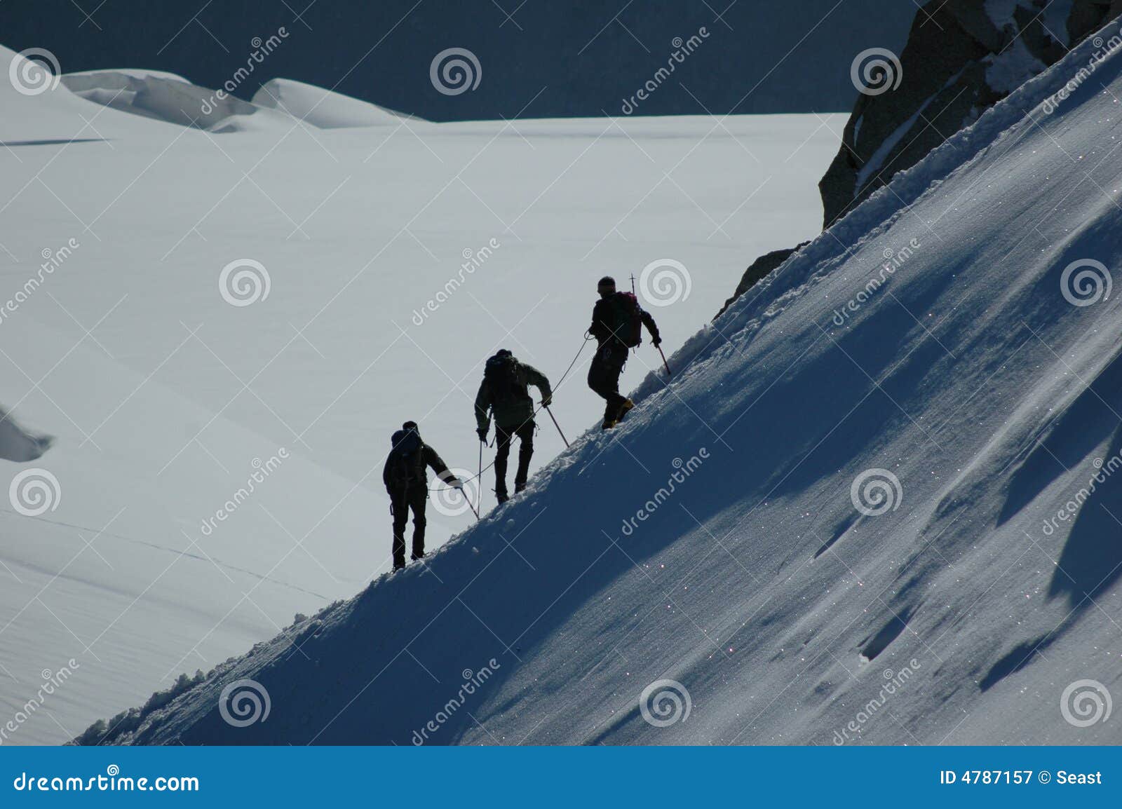 Climbers on ridge. Climbers on alpine ridge in the French Alps, France