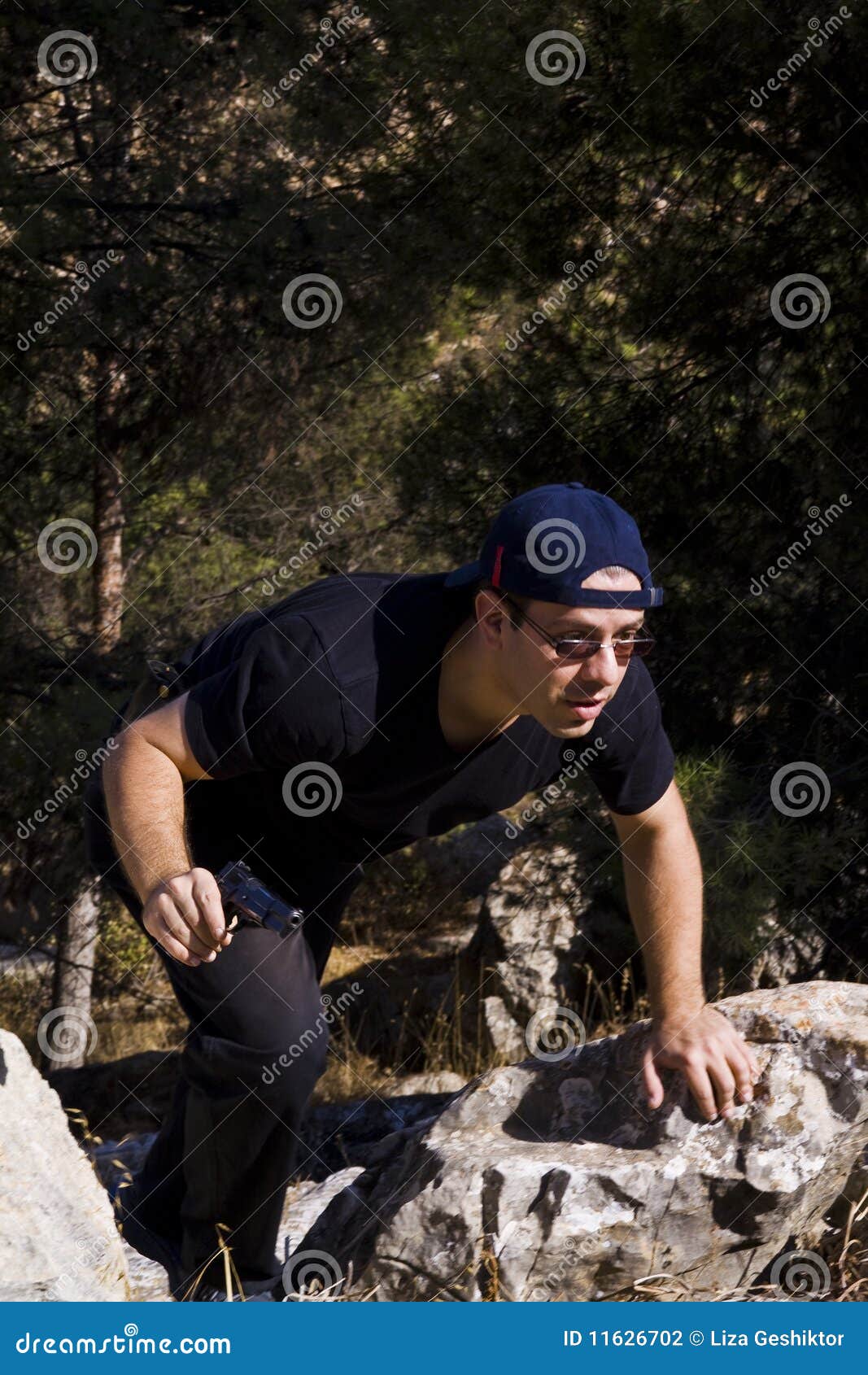 Climbing with a gun stock photo. Image of extreme, forest 11626702