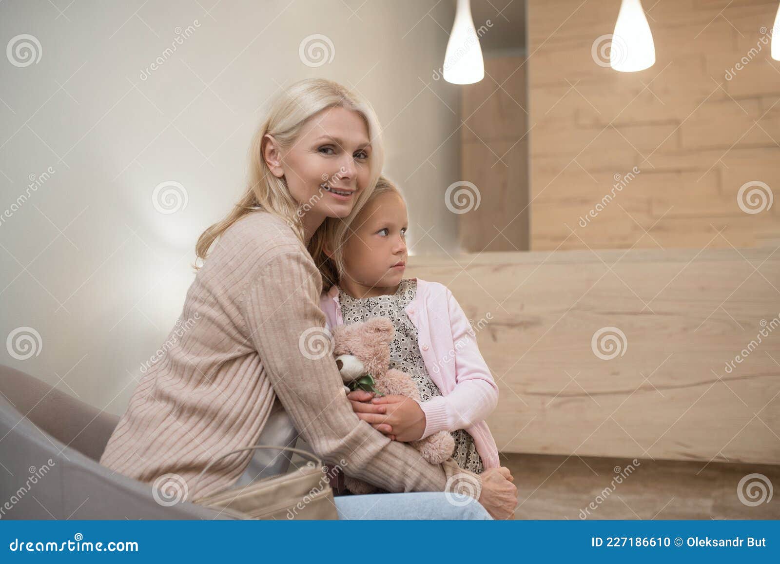 Mom And Her Daughter Waiting For The Appointment At The Clinic Stock Photo Image Of Women Pediadontist 227186610