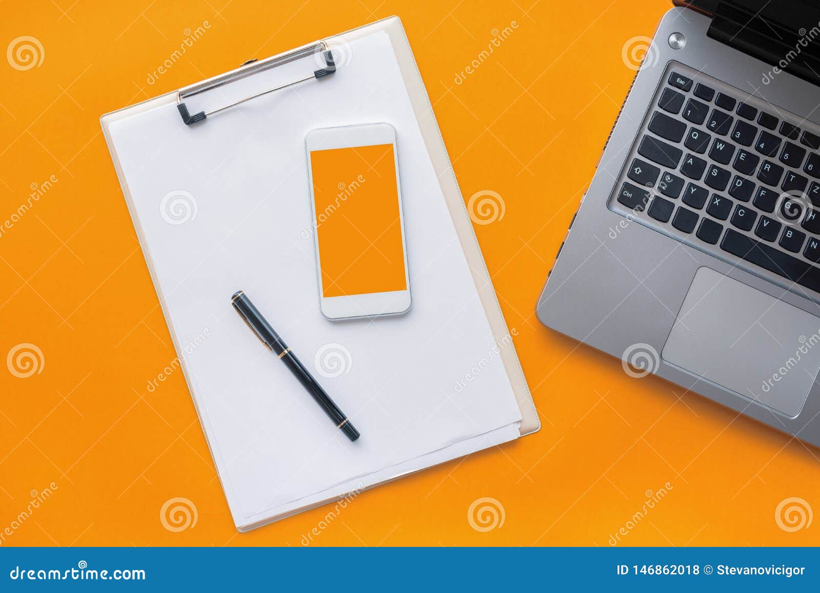 Clipboard Notepad, Smartphone and Laptop Computer Stock Photo Image