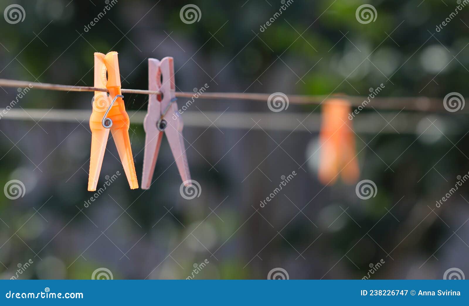 Clips for drying clothes. Clips on the rope for drying the laundry after washing