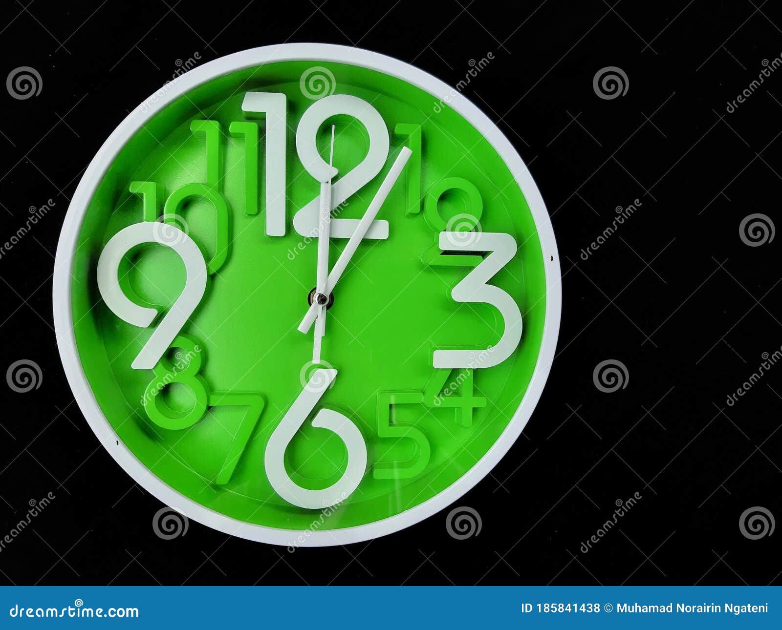 Clock on Black Background. the Time is 1205 am or Pm. Twelve O Clock