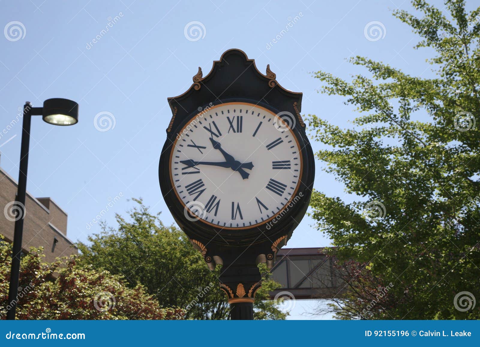 Clock on College Campus stock photo. Image of campuses 92155196