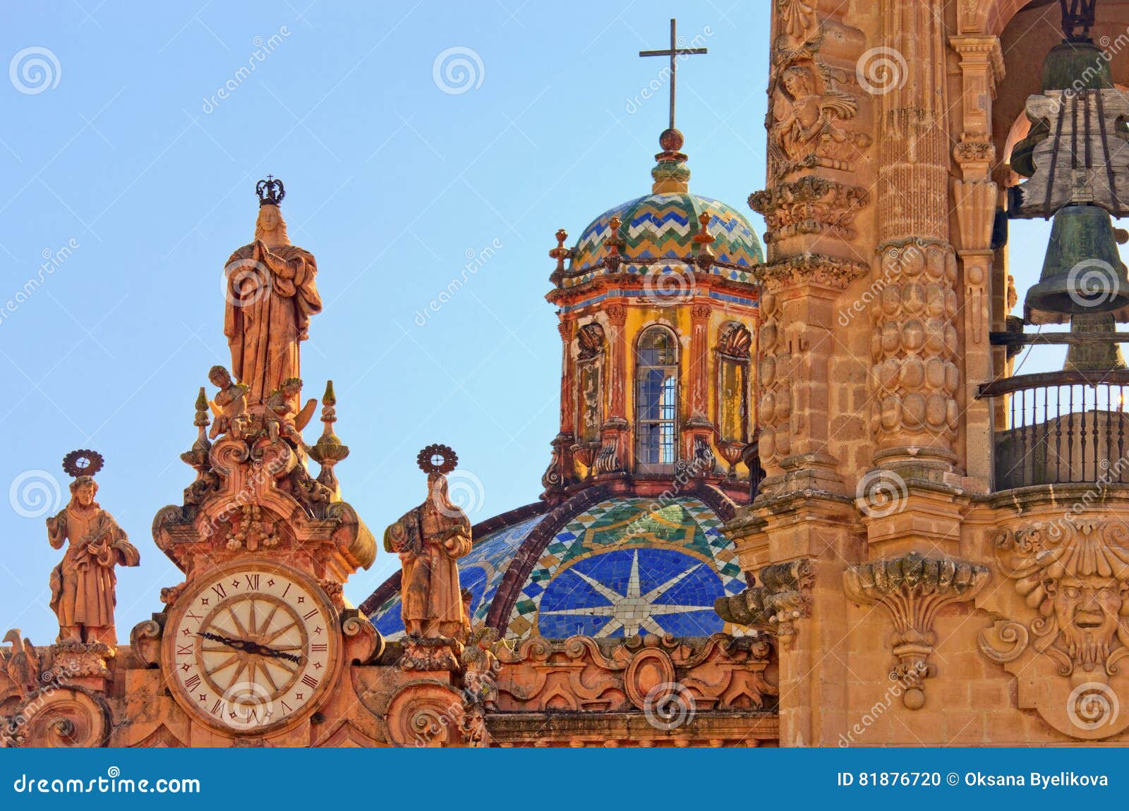 clock on santa prisca church in taxco, mexico