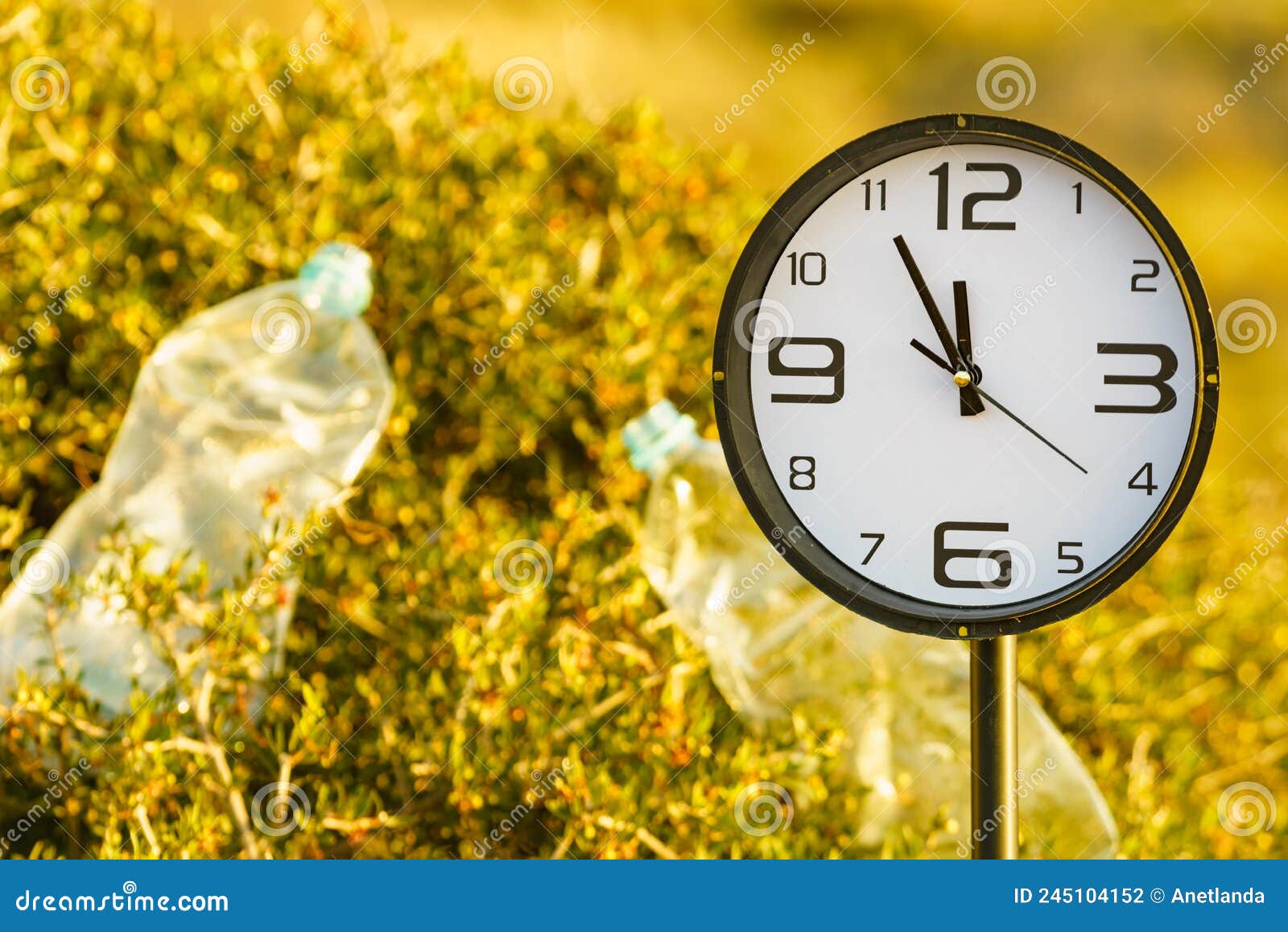 Clock Ticking on Polluted Nature. Ecology Stock Photo Image of